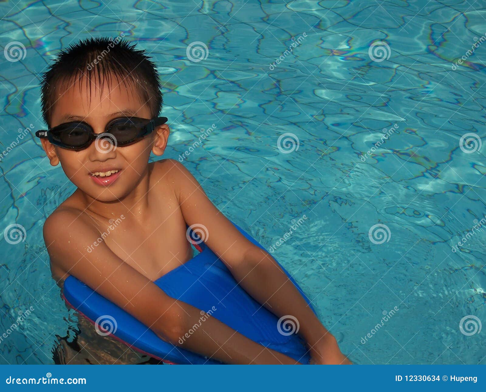 Boy swimming stock photo. Image of movement, face, male 12330634