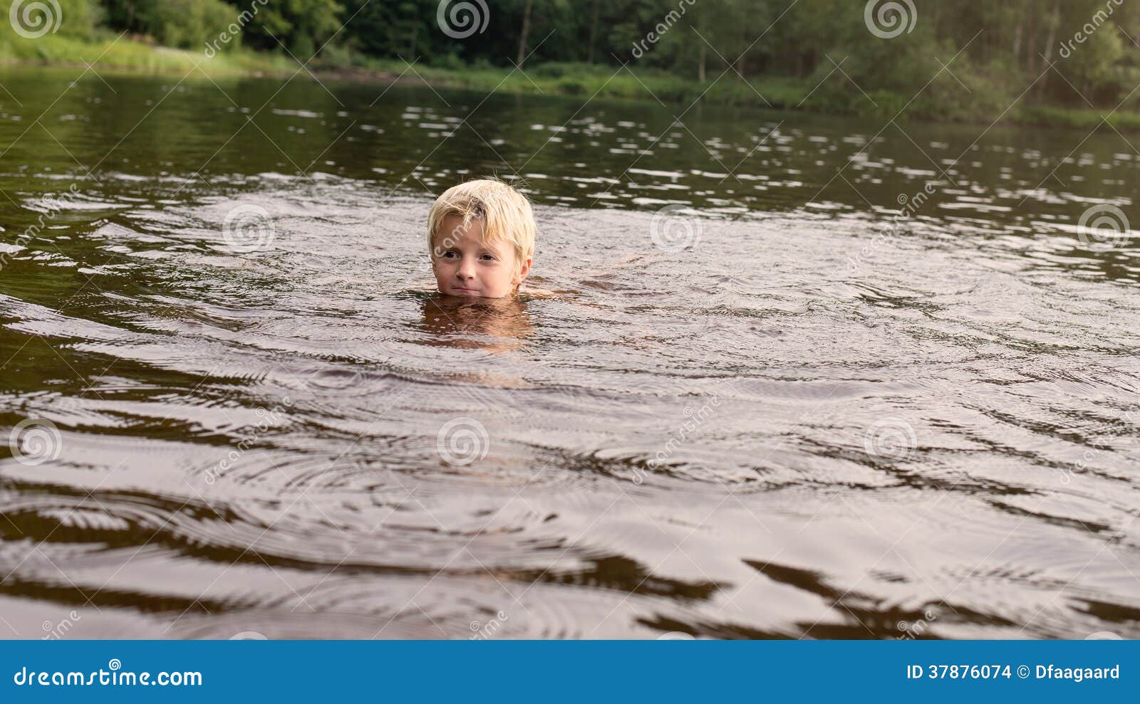 Boy swimming in a lake stock photo. Image of sweden, scandinavian