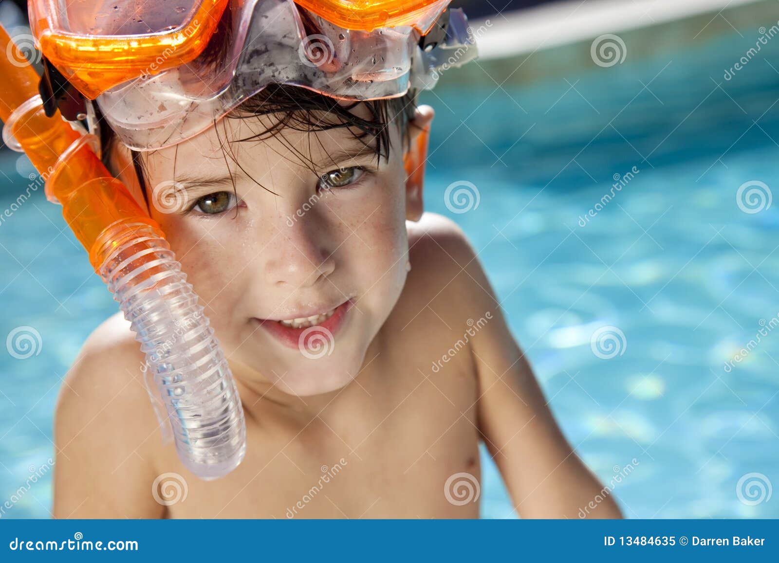 Boy in a Swimming Pool with Goggles and Snorkel Stock Image Image of
