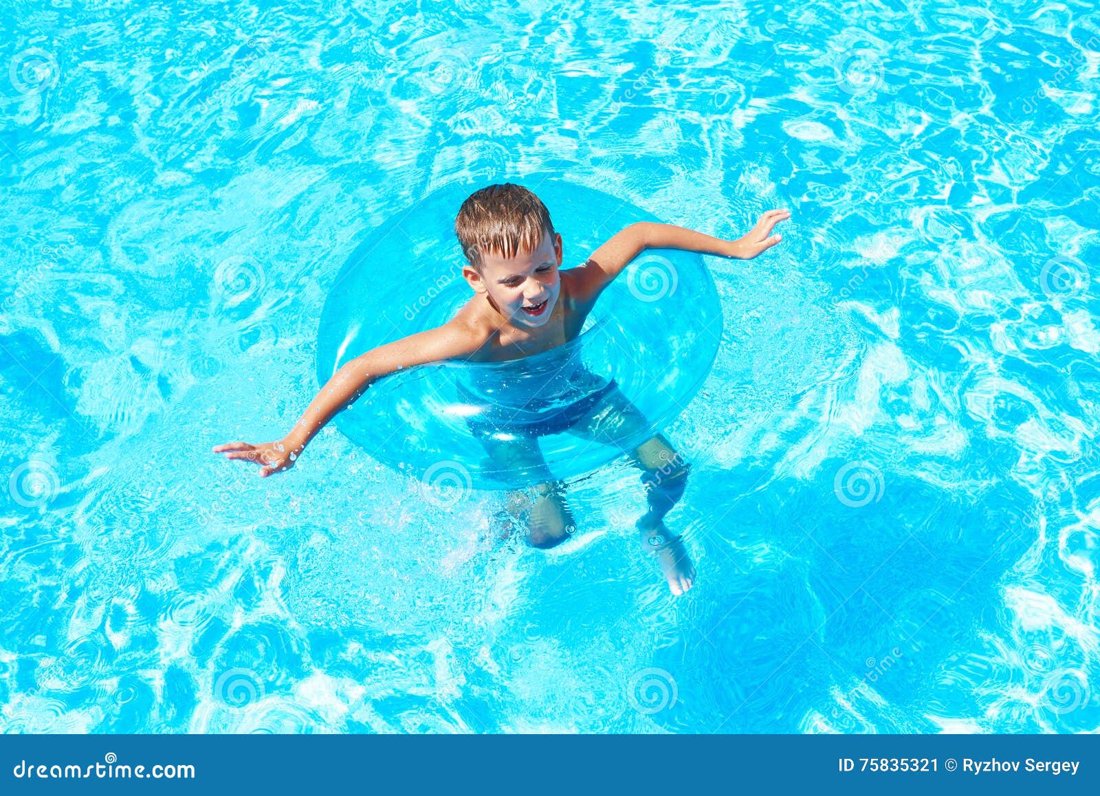 Boy swimming into pool stock image. Image of energetic 75835321