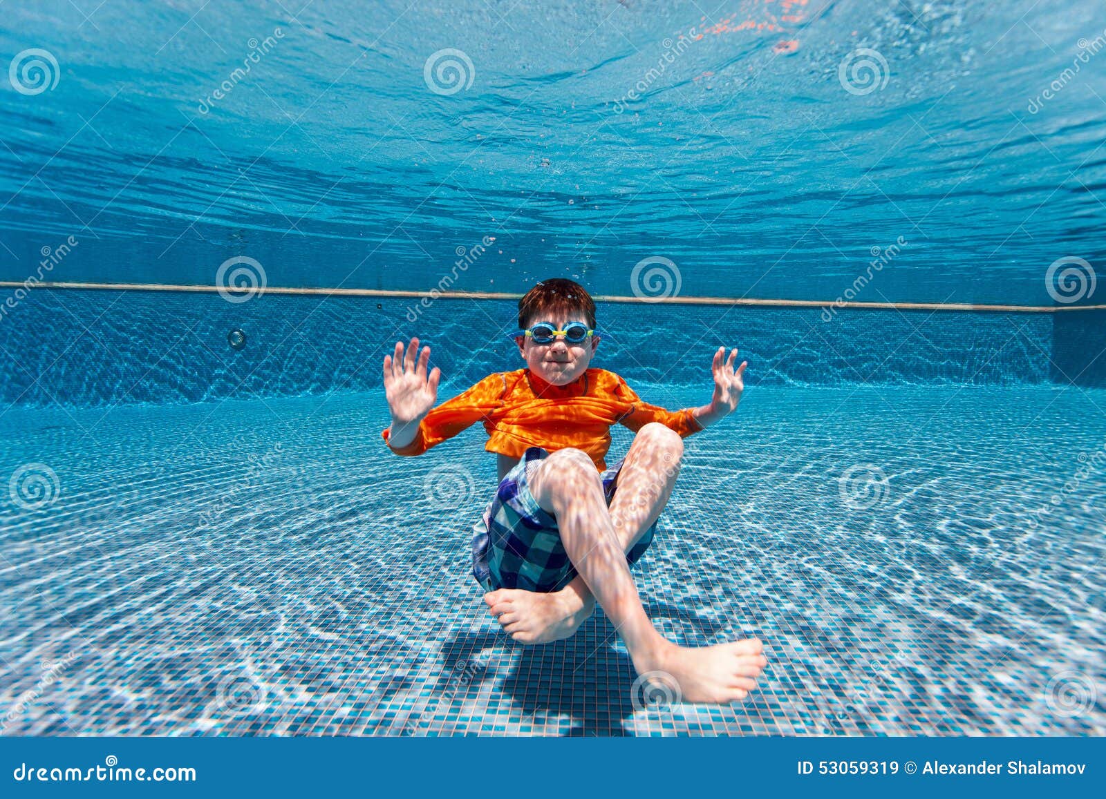 Boy swimming underwater stock image. Image of enjoyment 53059319