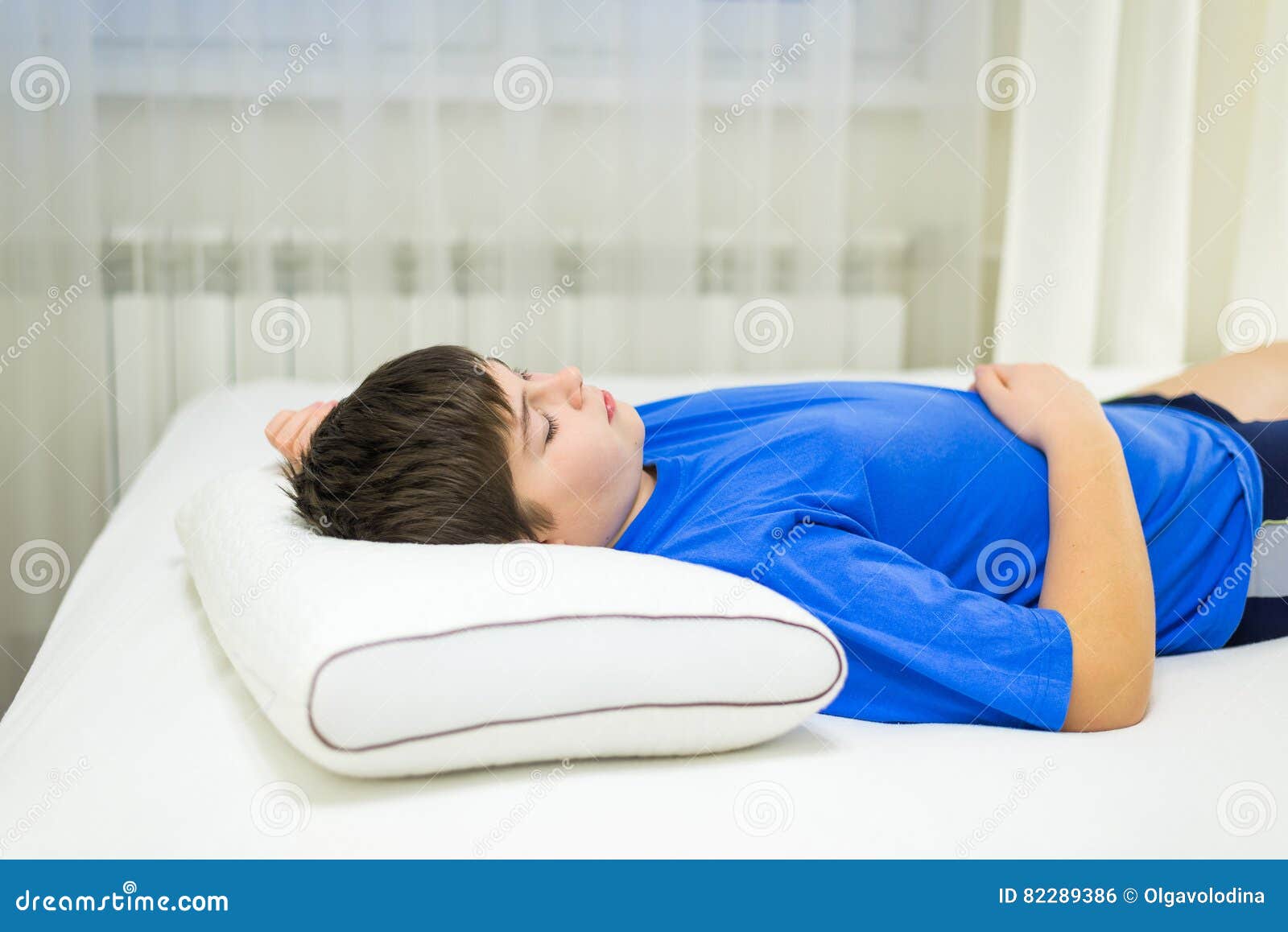 Boy Teenager Sleeping on Anatomic Pillow Stock Photo Image of