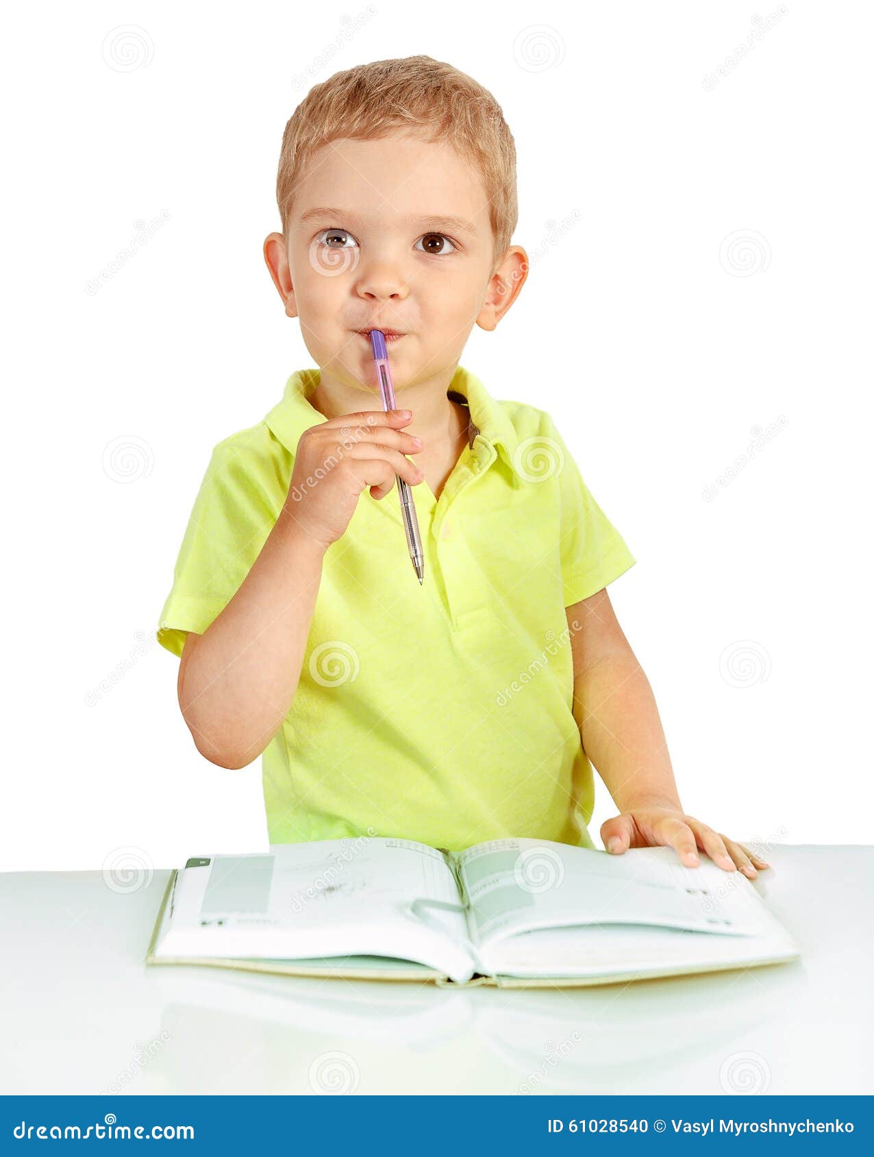 Boy Thinks with Pen in Mouth Stock Photo Image of attractive, holding