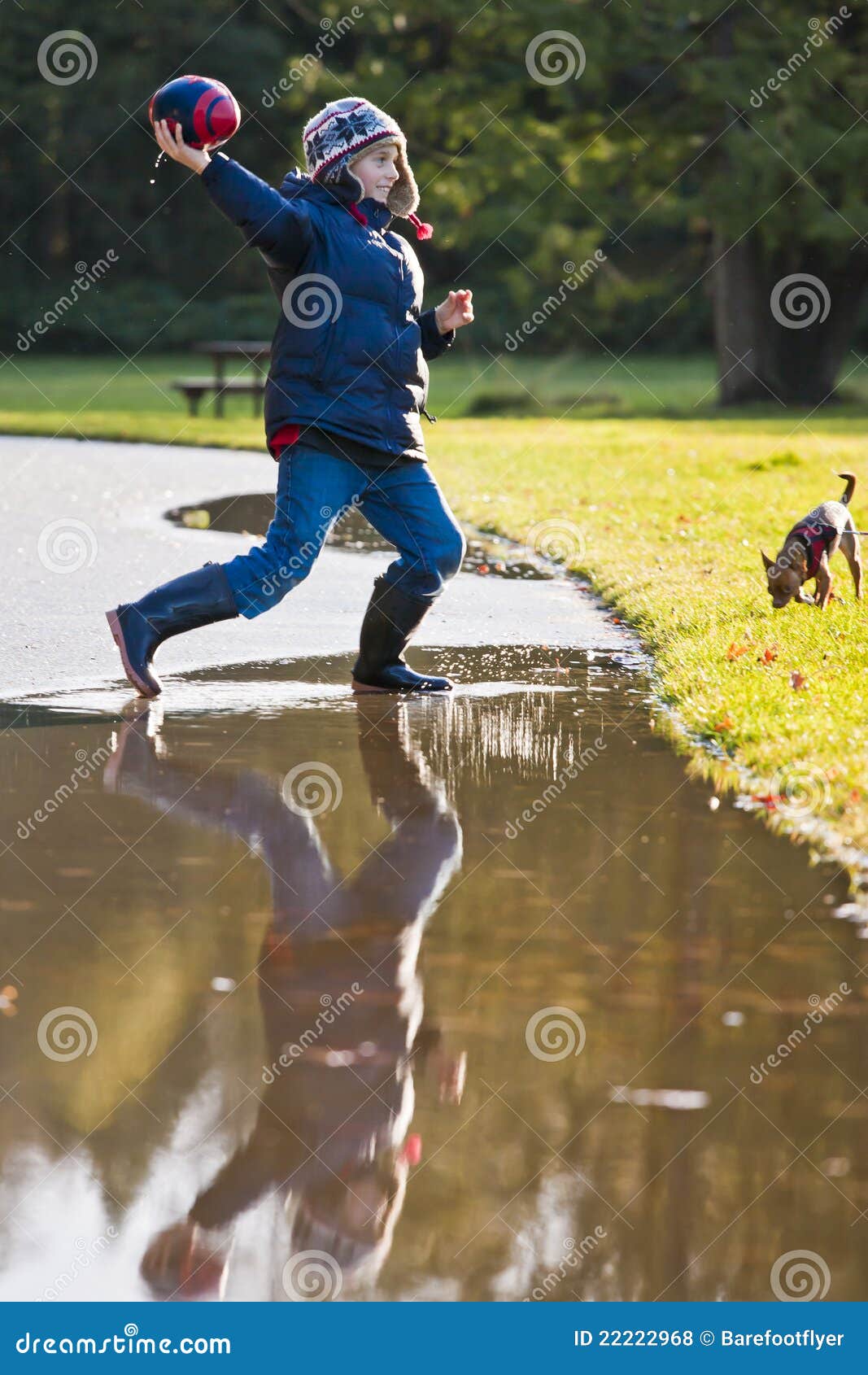 Boy Throwing a Football stock photo. Image of people 22222968