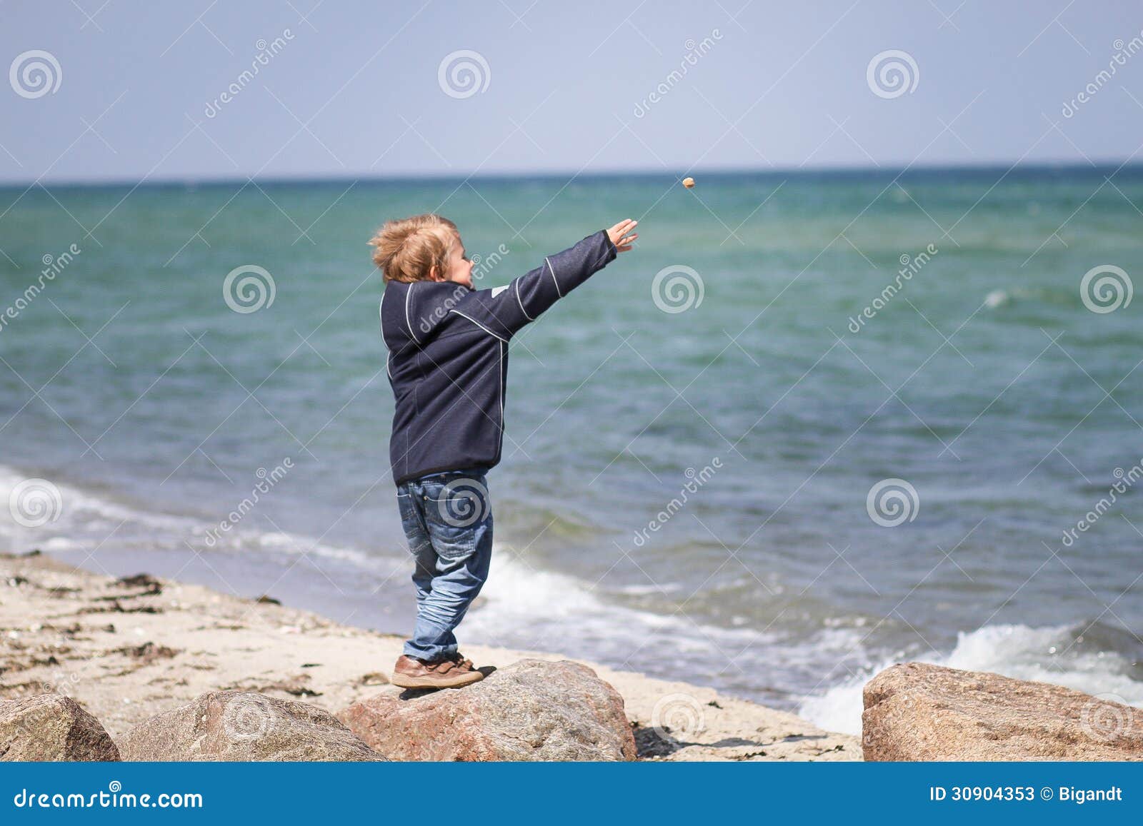 Boy Throwing Stones at Beach Stock Image Image of years, stone 30904353