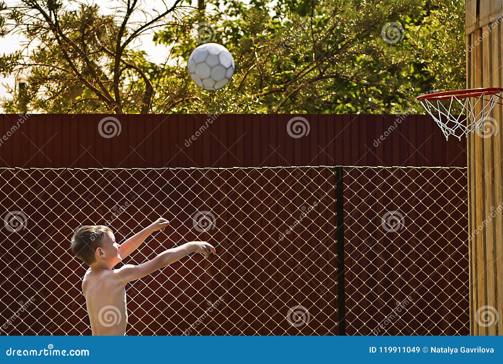 Boy Throws the Ball into the Ring Stock Image Image of outside