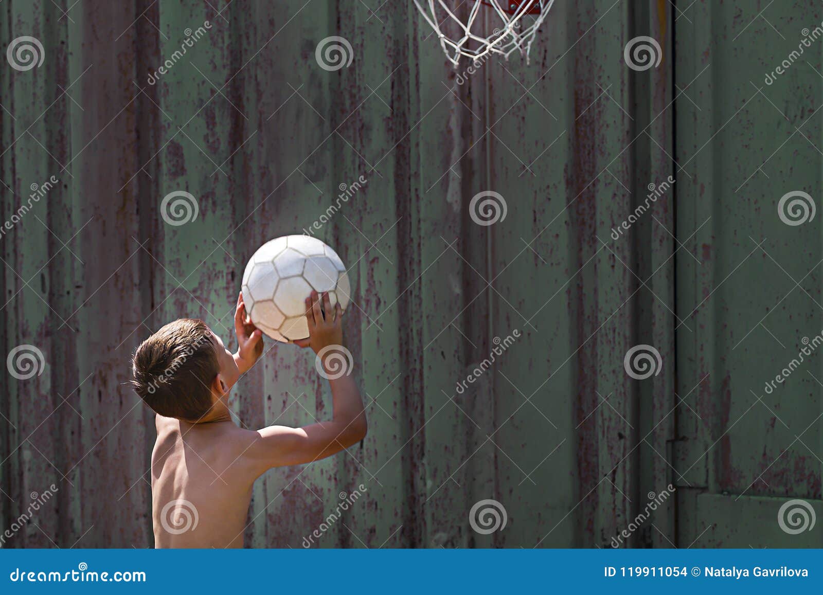 Boy Throws the Ball into the Ring Stock Photo Image of activity, kids 119911054