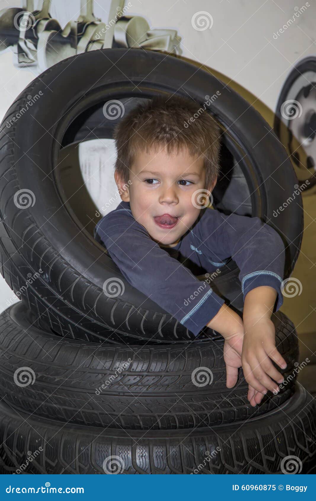 Boy and tires stock image. Image of tool, mechanical 60960875