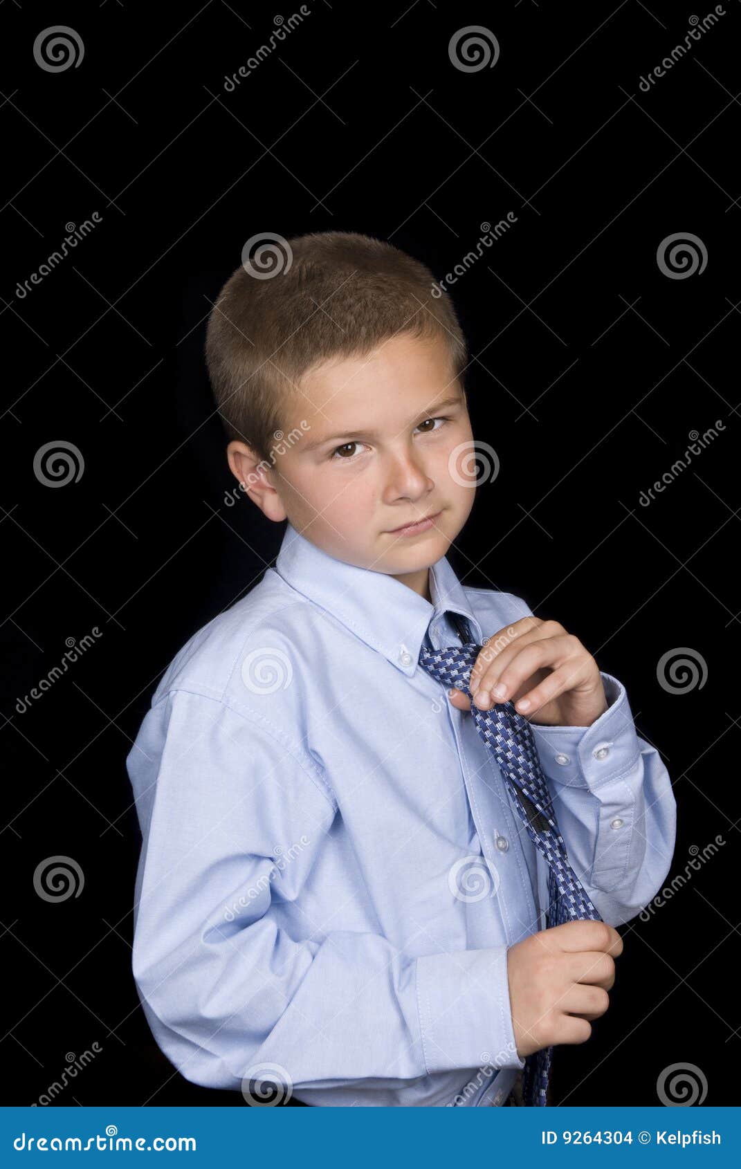 Boy tying his necktie stock photo. Image of necktie, concepts 9264304
