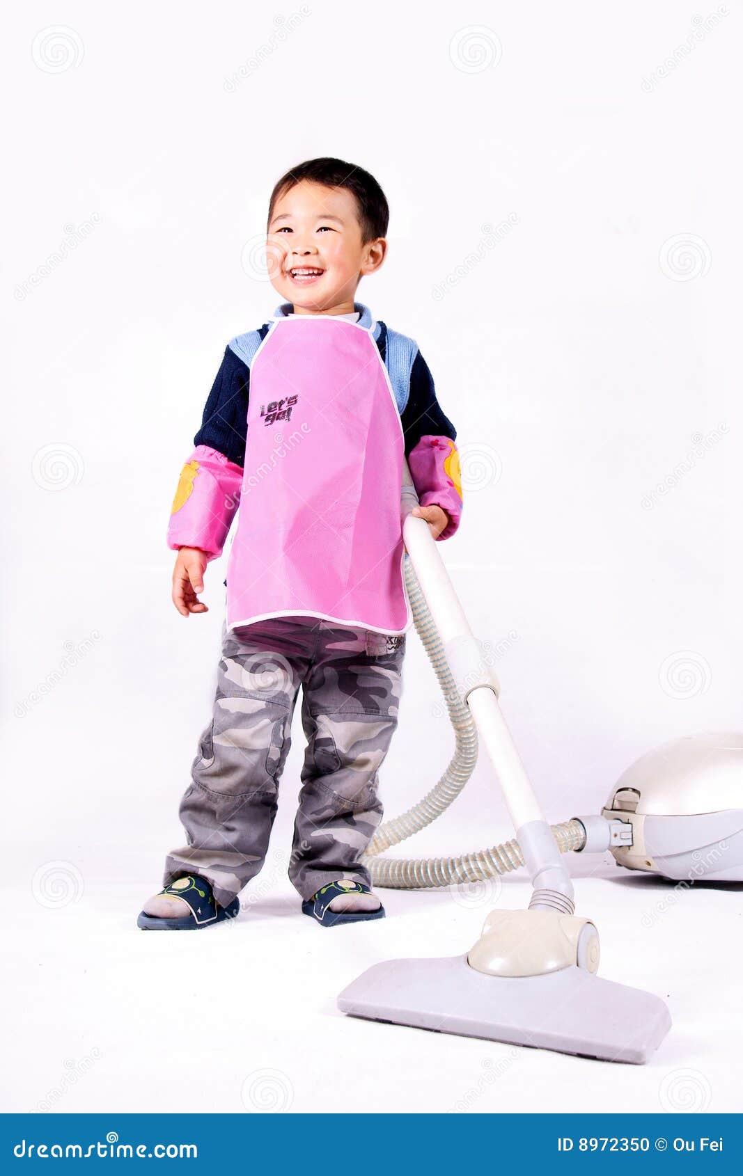 Boy and vacuum cleaner stock photo. Image of chores, cleaner 8972350