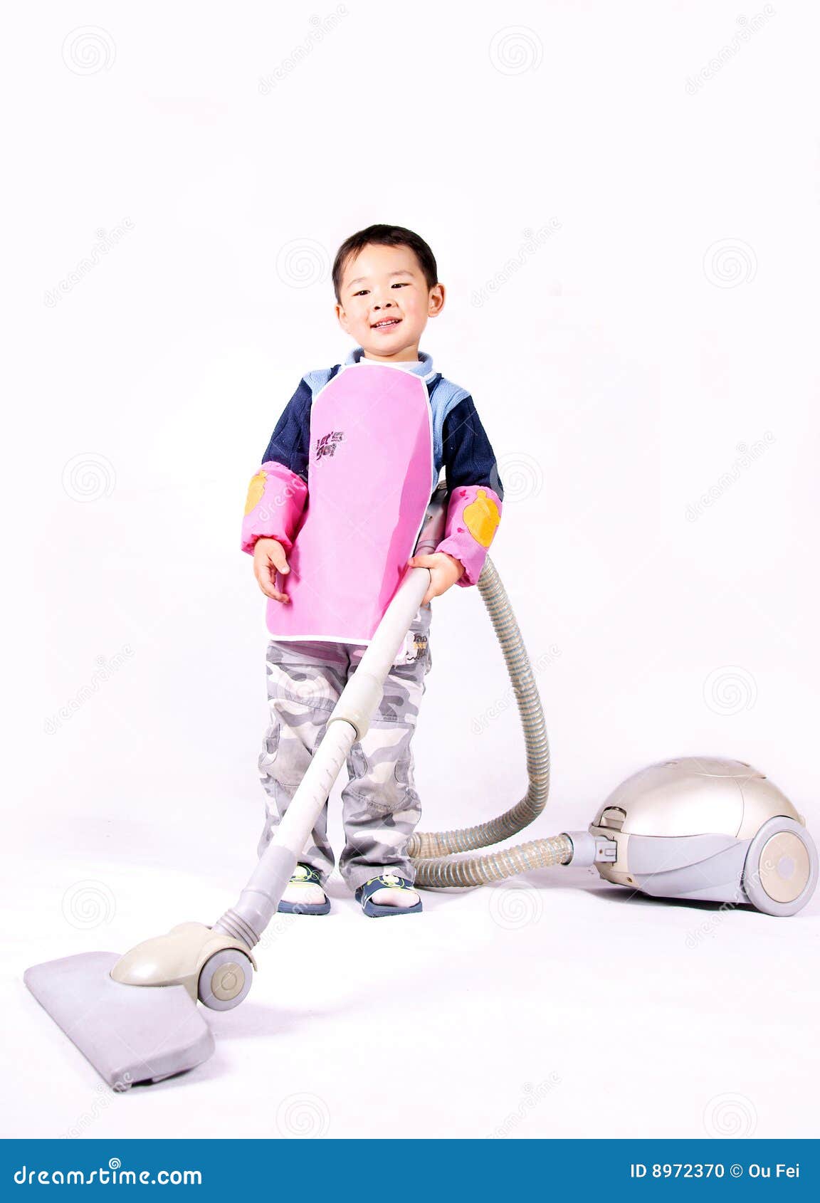 Boy and vacuum cleaner stock photo. Image of house, vacuum 8972370