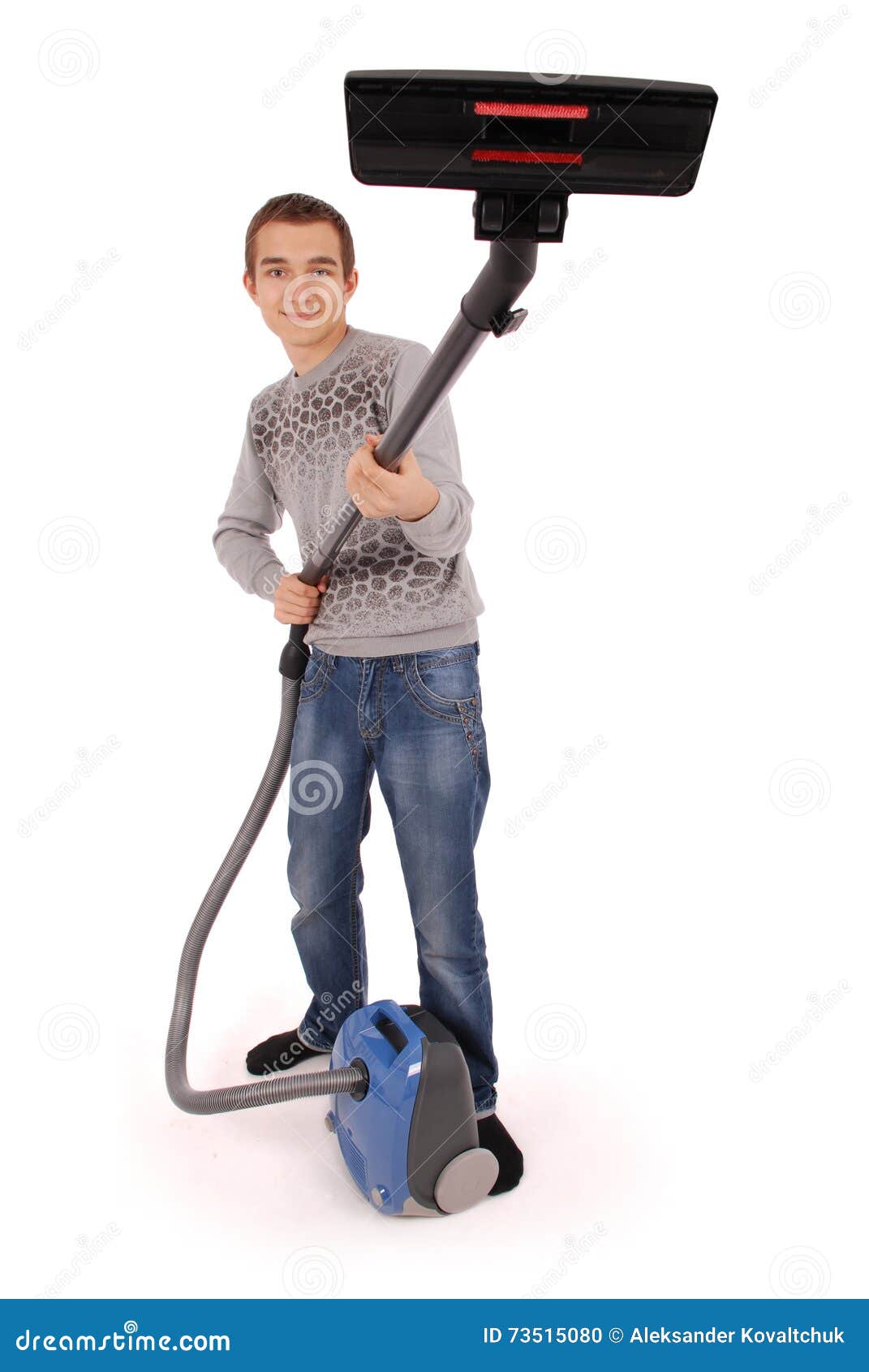 Boy with vacuum cleaner stock photo. Image of domestic 73515080