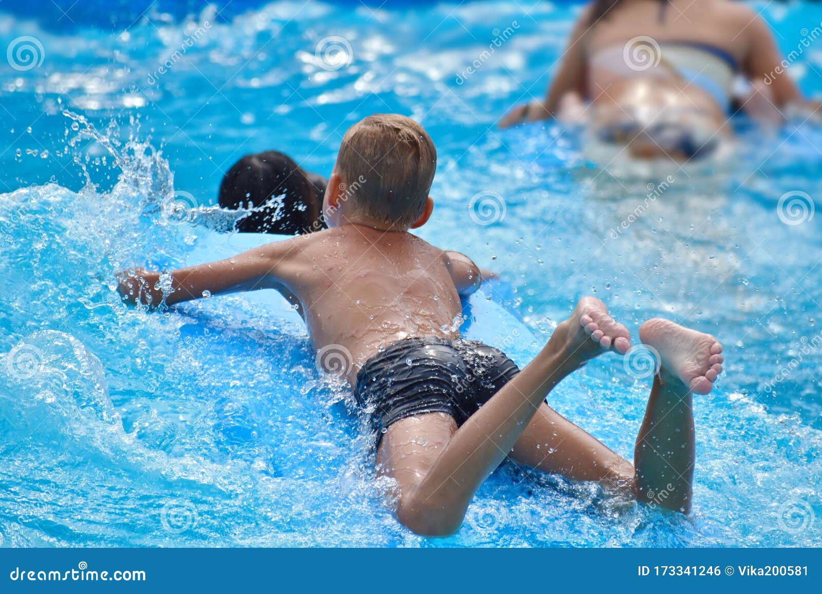 Little boy at aqua park stock photo. Image of blue, park 