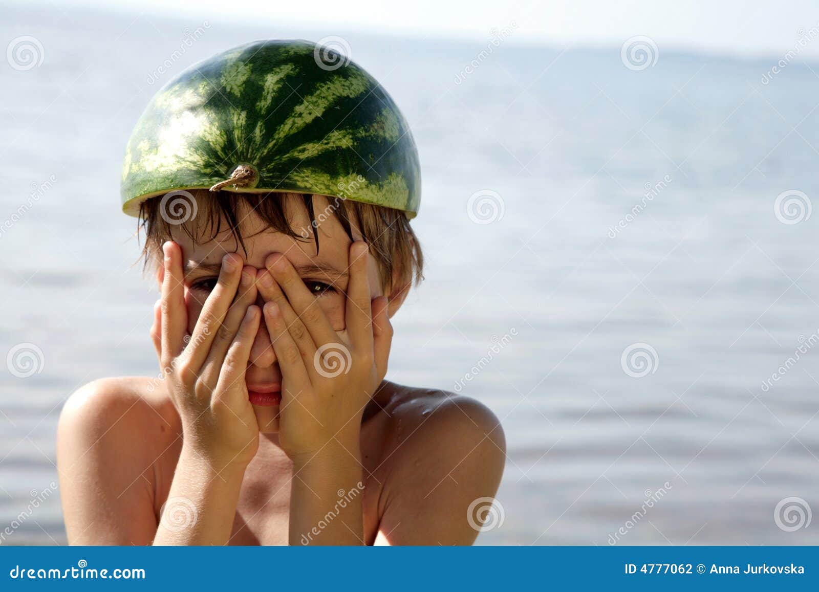 Boy with watermelon hat stock photo. Image of outdoors 4777062