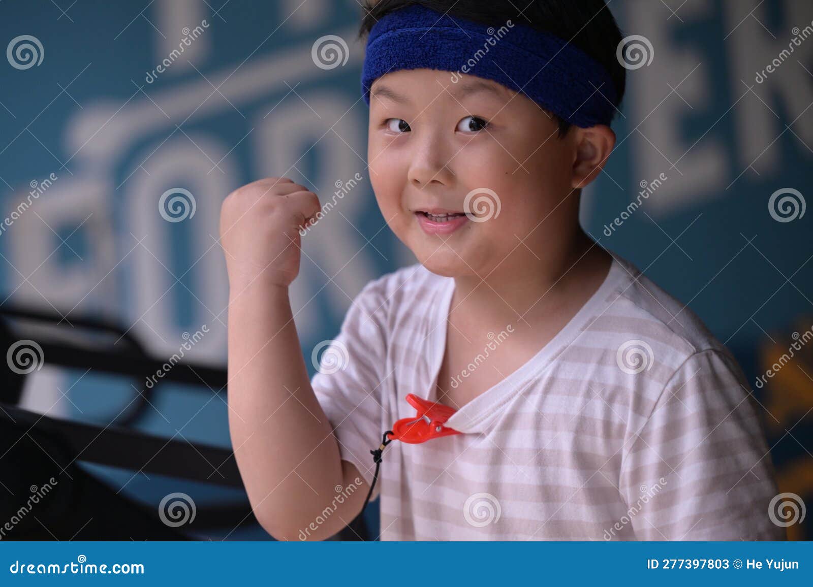 A Boy Wearing a Headband Exercising Stock Image Image of wearing