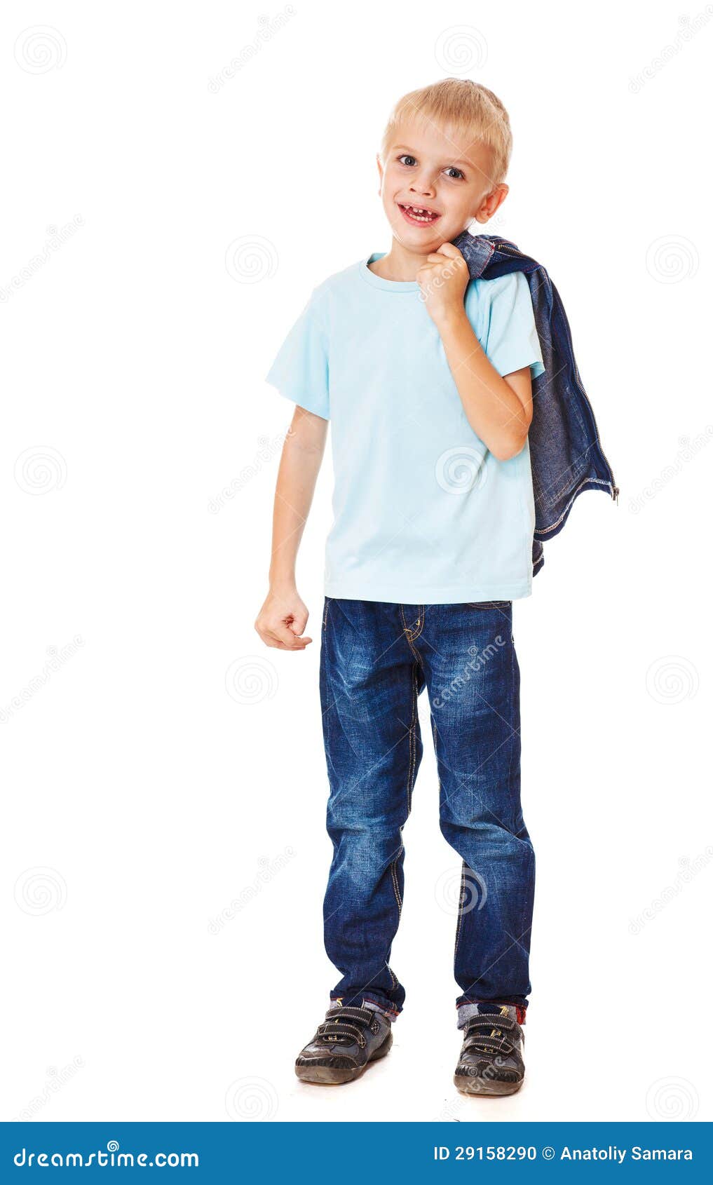 He is wearing jeans. Мальчик смеется во весь рост. Ребенок в свободных синих джинсах. He Wears Jeans.