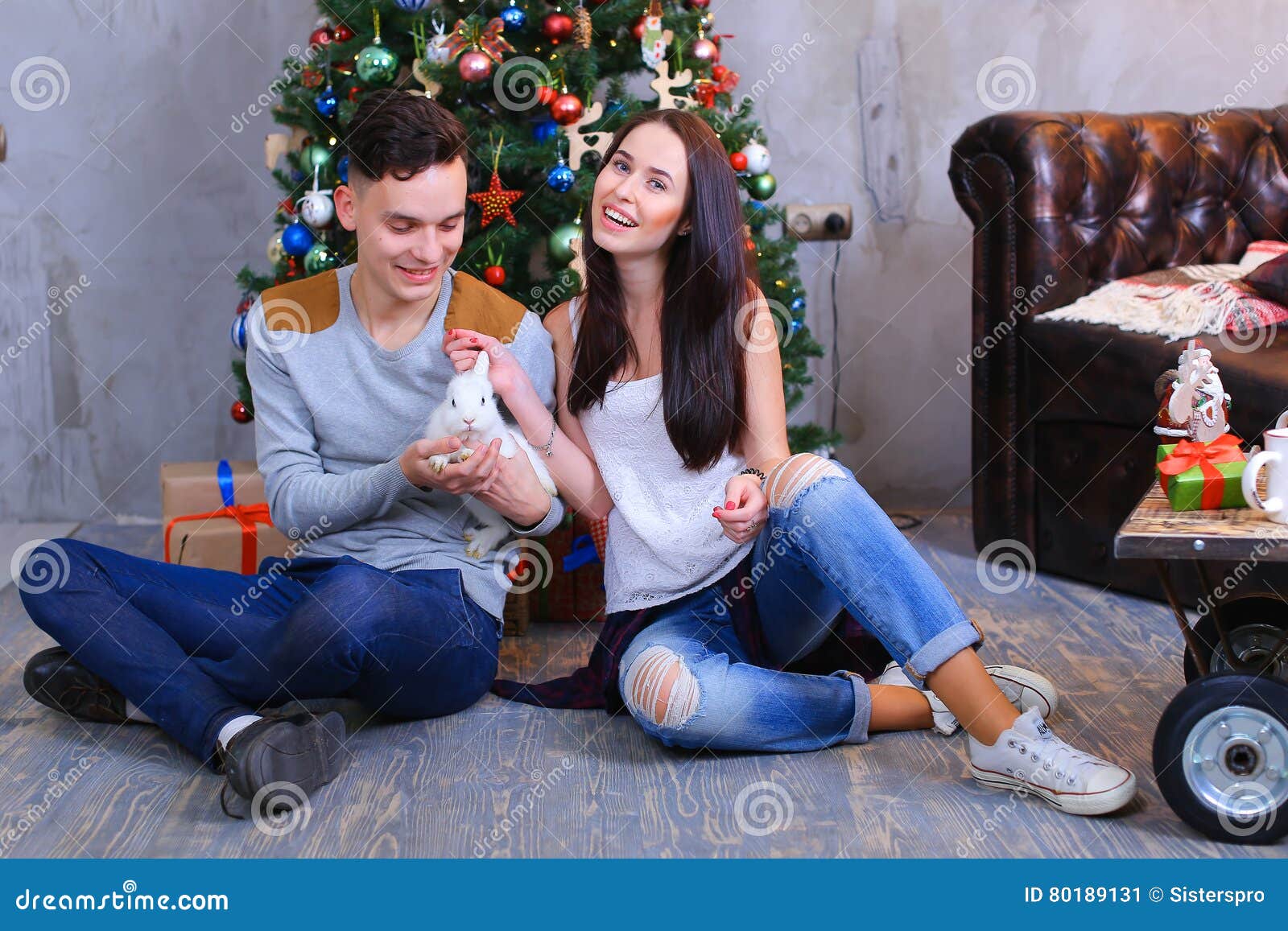 Full length portrait of a casual young couple posing isolated on white  background Stock Photo - Alamy