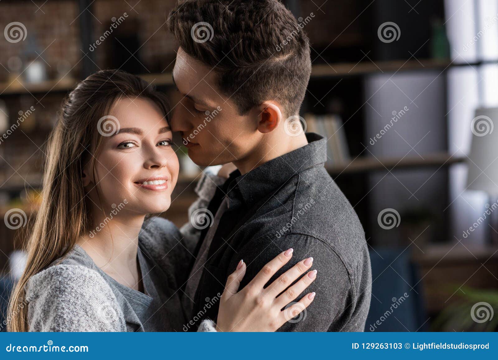 Boyfriend Kissing Girlfriend and she Looking Stock Image Image of