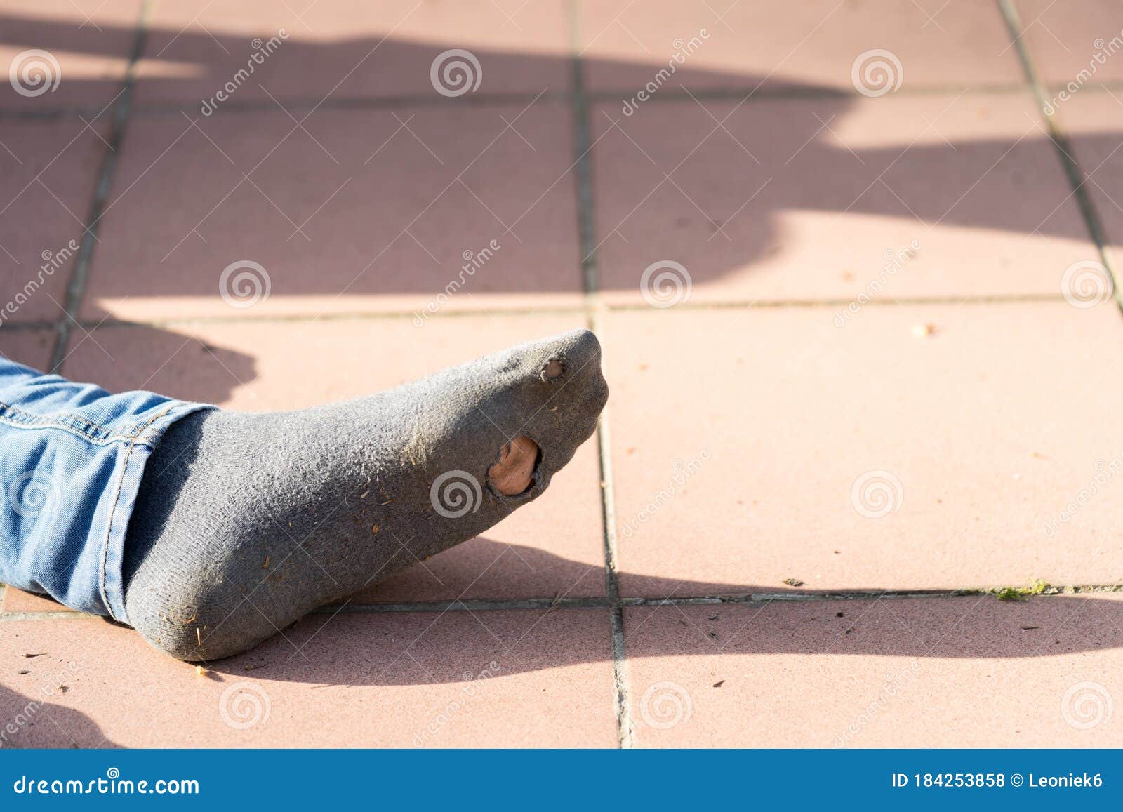 Boys Foot with Jeans and an Old Sock with a Hole in it Outside Stock ...