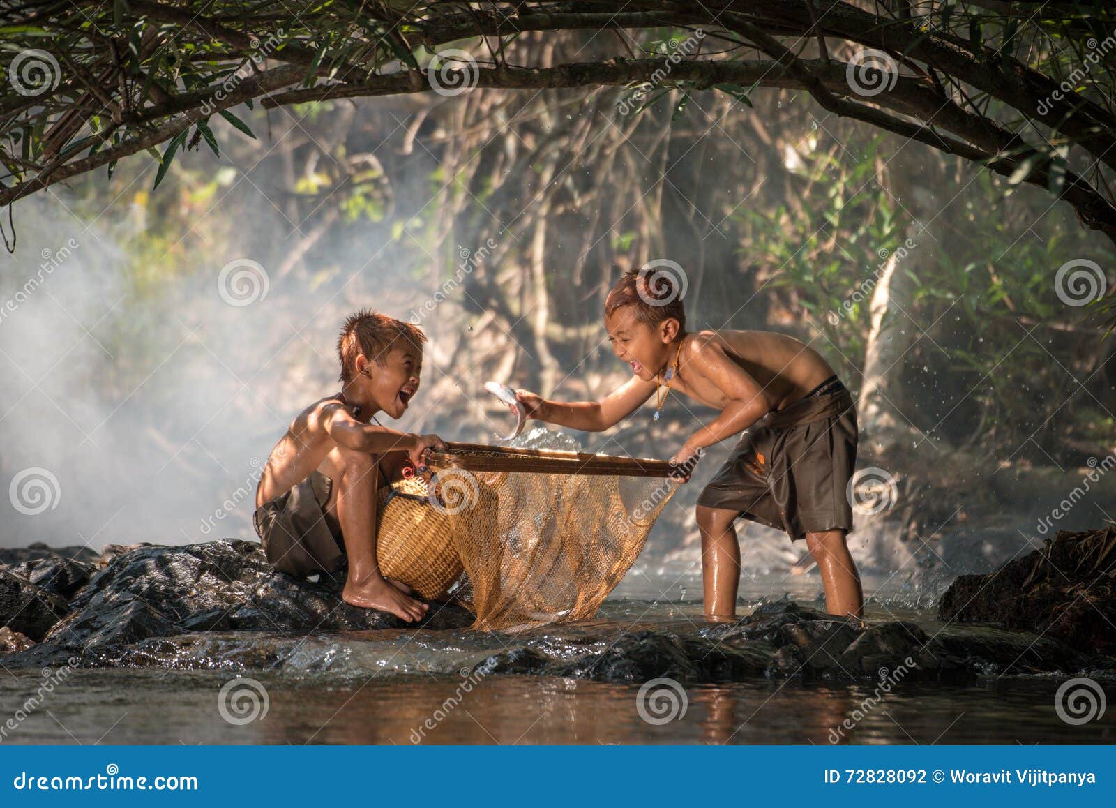 Boys Laugh fish on hands stock photo. Image of fishing - 72828092