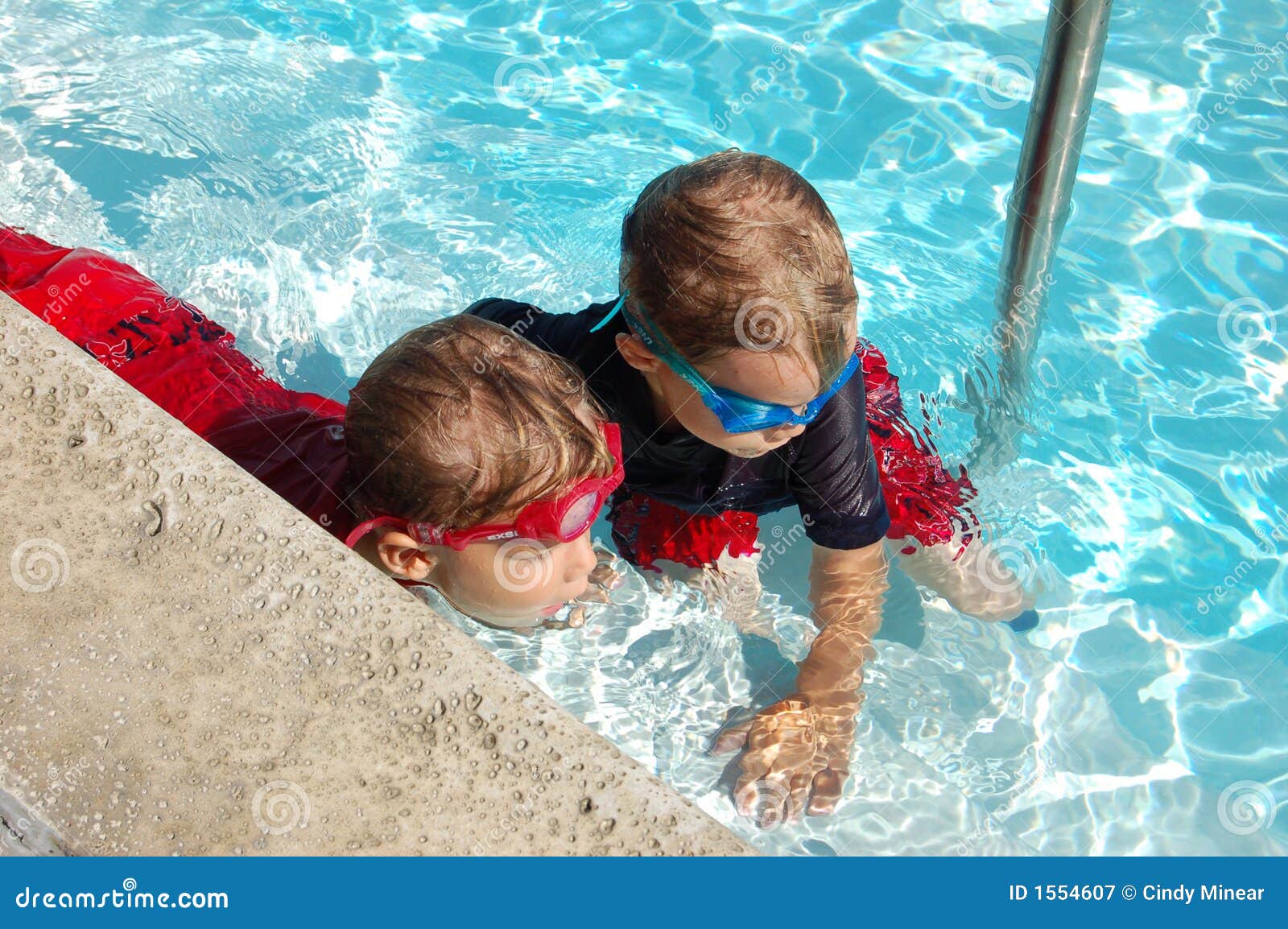 Boys in a Pool stock image. Image of pool, swim, blue 1554607