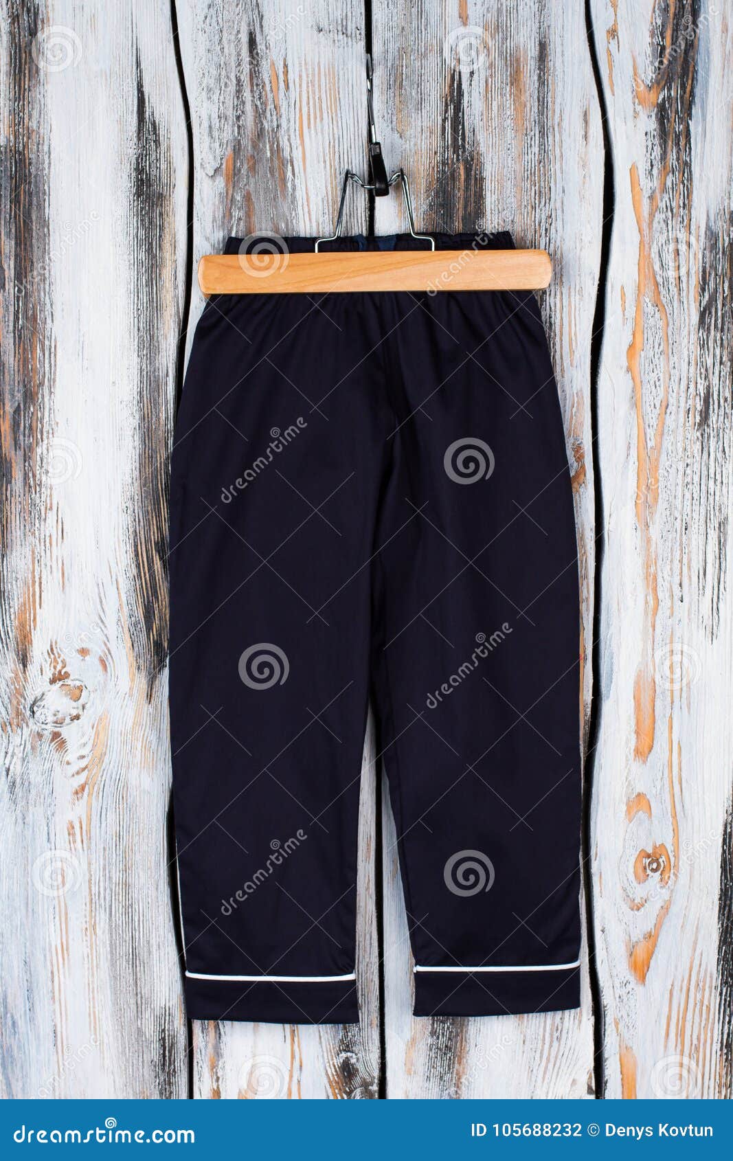 Boys Sweatpants on a Hanger Stock Photo - Image of garment, night ...
