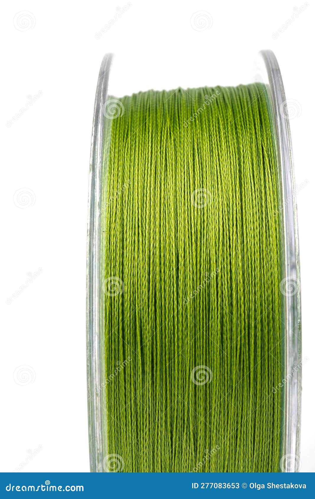 Braided Green Line for Fishing on a Transparent Coil, Isolate