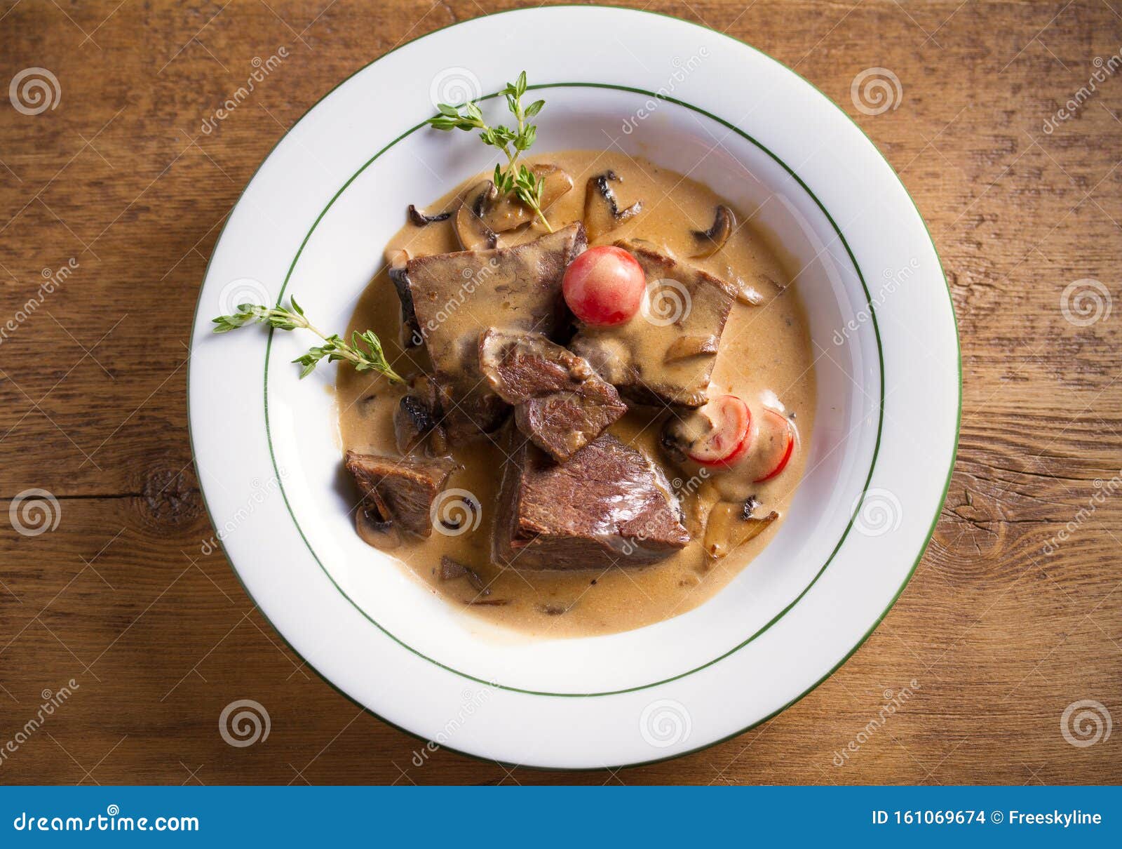 Braised Beef Cheeks in Cream Sauce with Mushrooms and Tomatoes in White