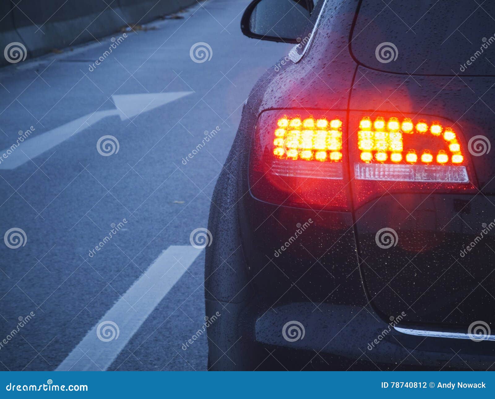 Brake light and arrow stock photo. Image of wetness, light 78740812