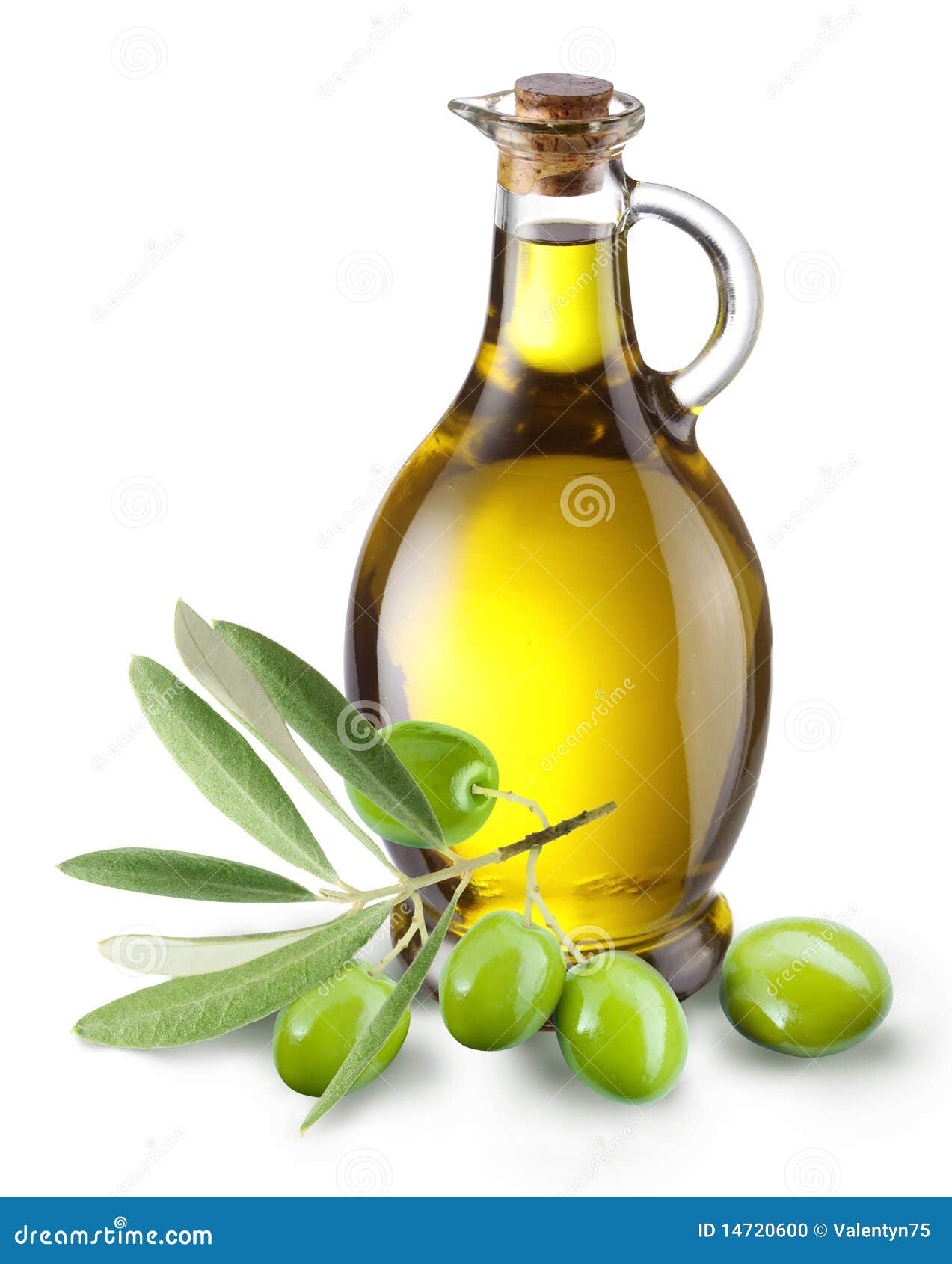 branch with olives and a bottle of olive oil