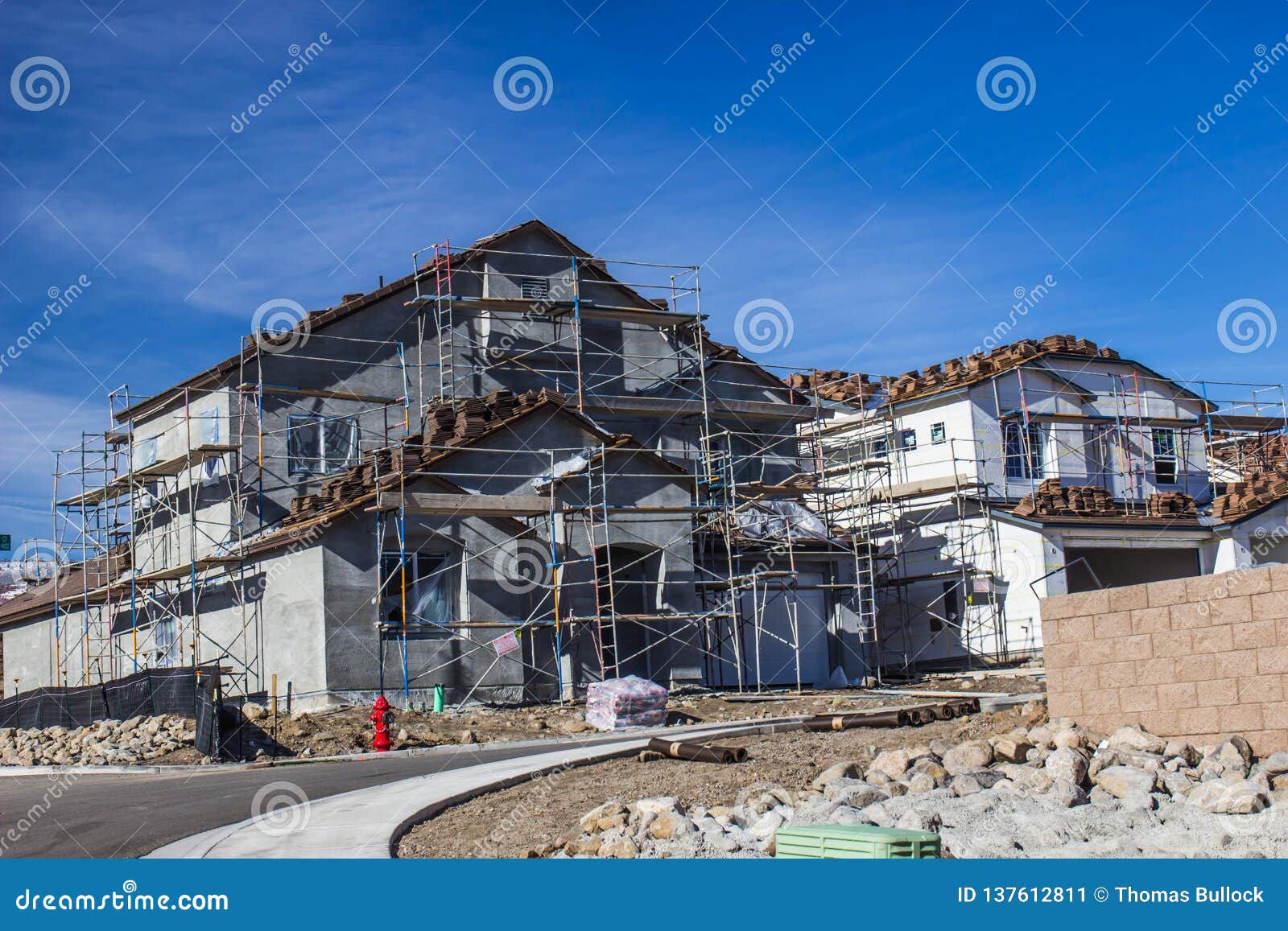 brand new home construction with scaffolding