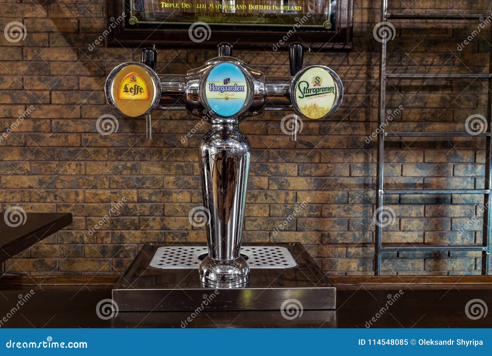 Beer dispenser at the bar editorial image. Image of drink 114548085