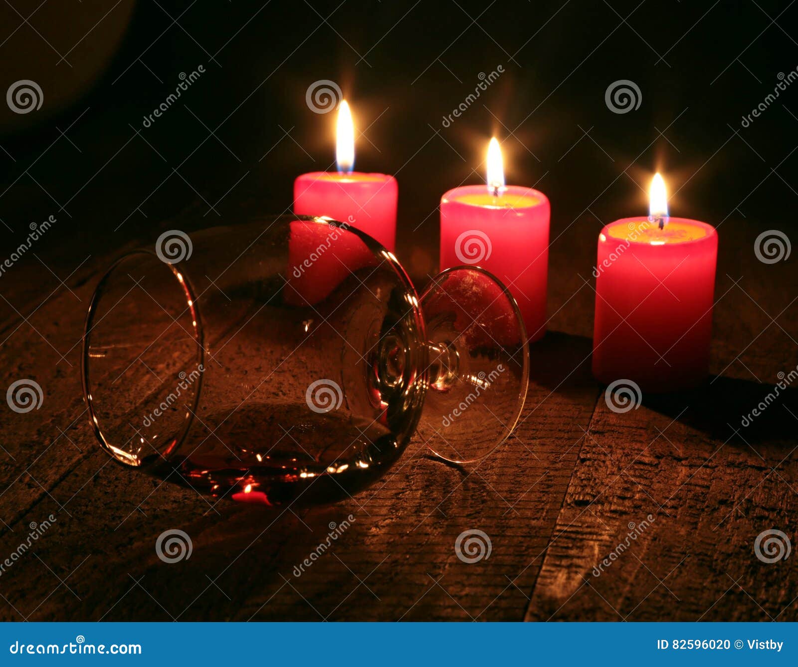 Brandy Glass and Candles on Black Background Stock Photo Image of