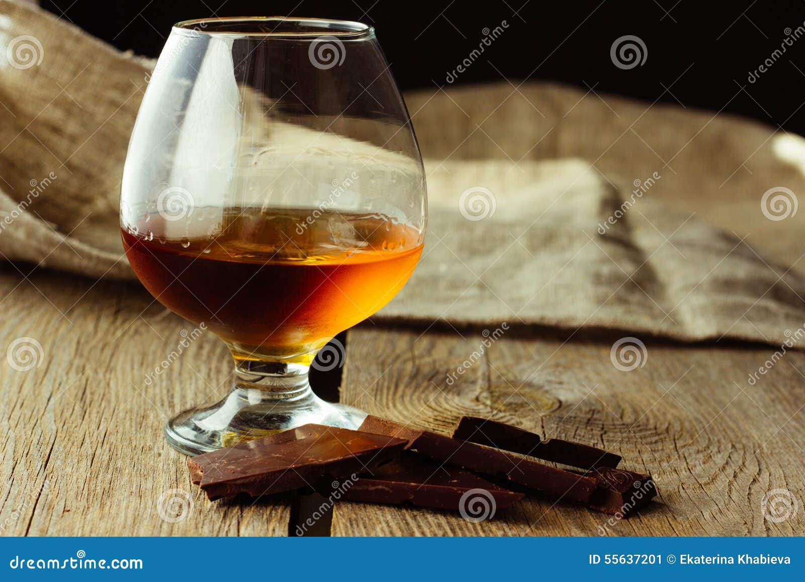 Brandy glass and chocolate stock image. Image of horizontal 55637201