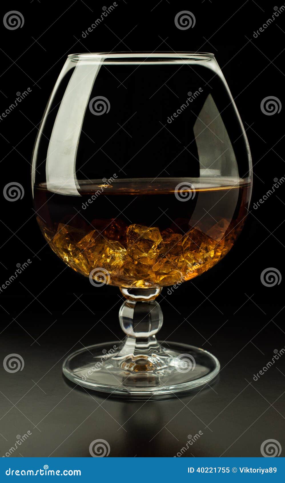 Brandy with ice stock image. Image of malt, cubes, life 40221755