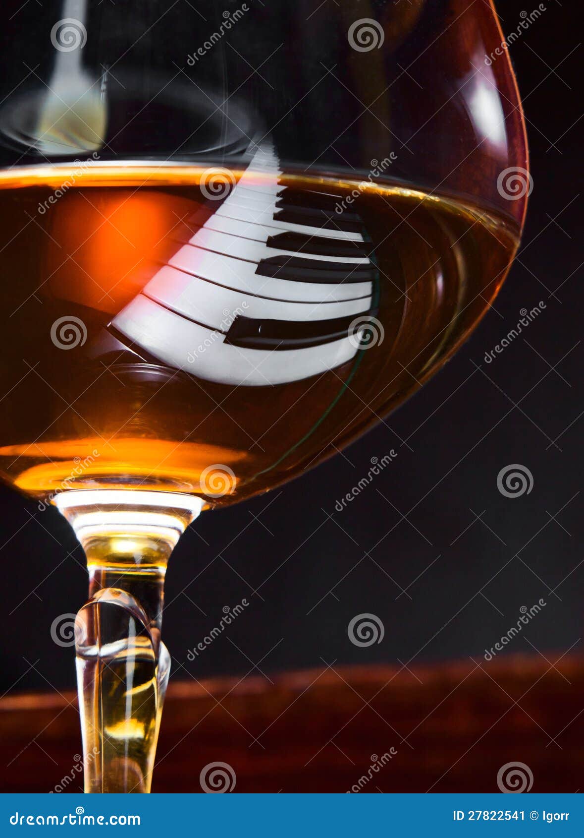 Brandy on a piano stock image. Image of brandy, alcohol 27822541