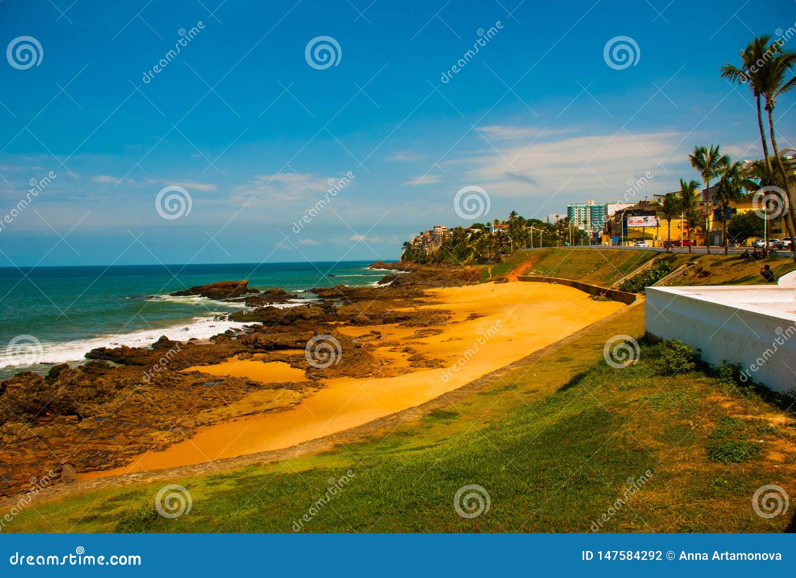 Brazilian beach with yellow sand and blue sea in Sunny weather. Brazil. Salvador. South America. Brazilian beach with yellow sand and blue sea in Sunny weather. Brazil. Sao Salvador da Bahia de Todos os Santos. South America