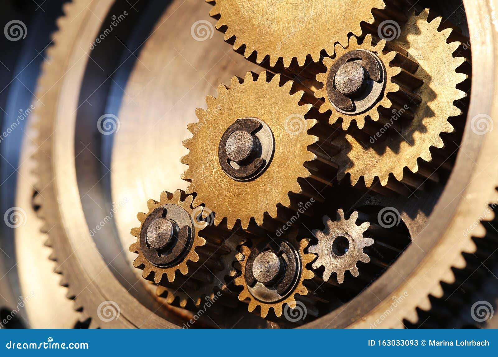 Brass Gears of a Locking Mechanism Stock Image - Image of golden