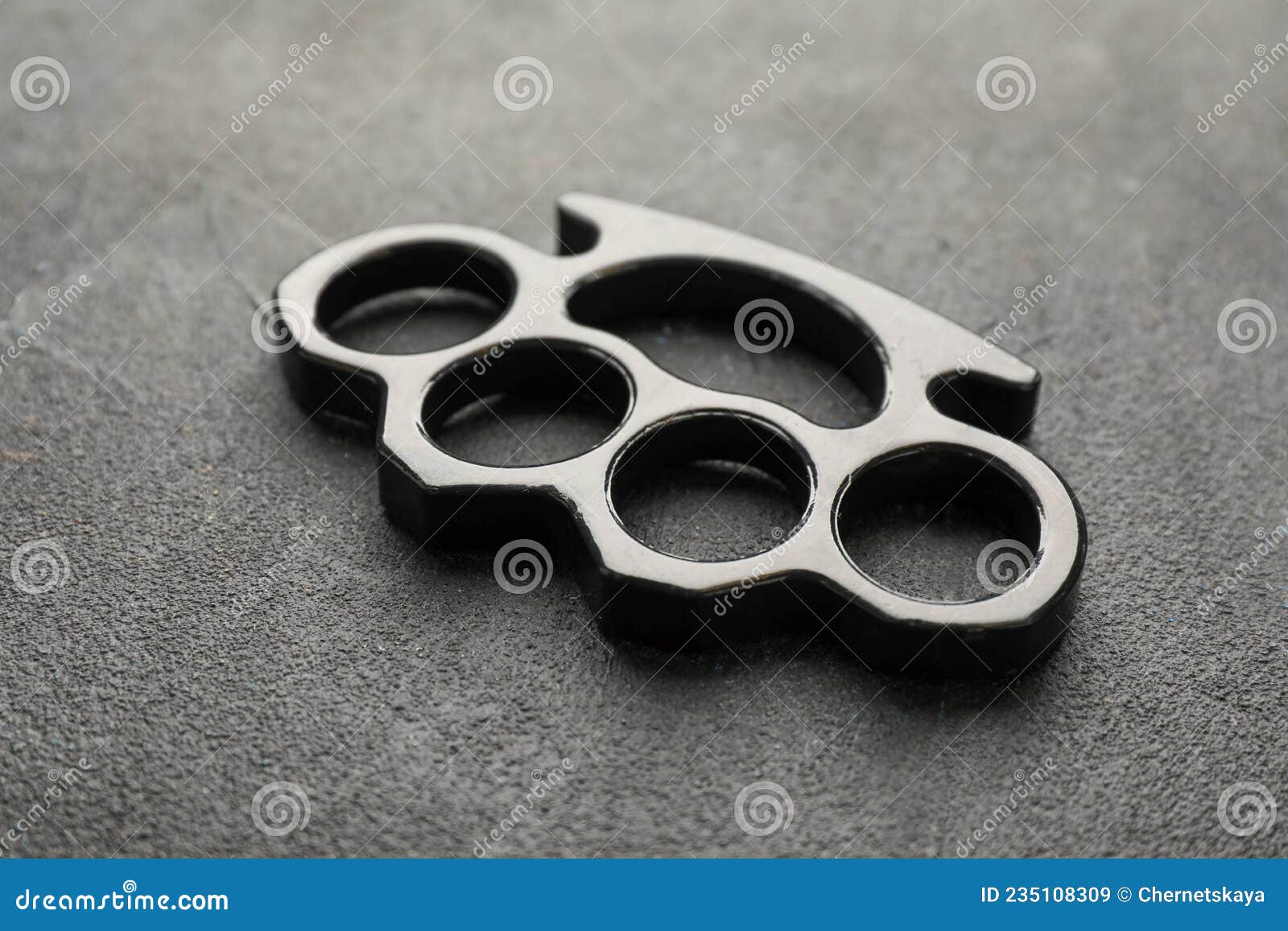 Brass Knuckles on Black Stone Background, Closeup Stock Image - Image of  illegal, damage: 235108309