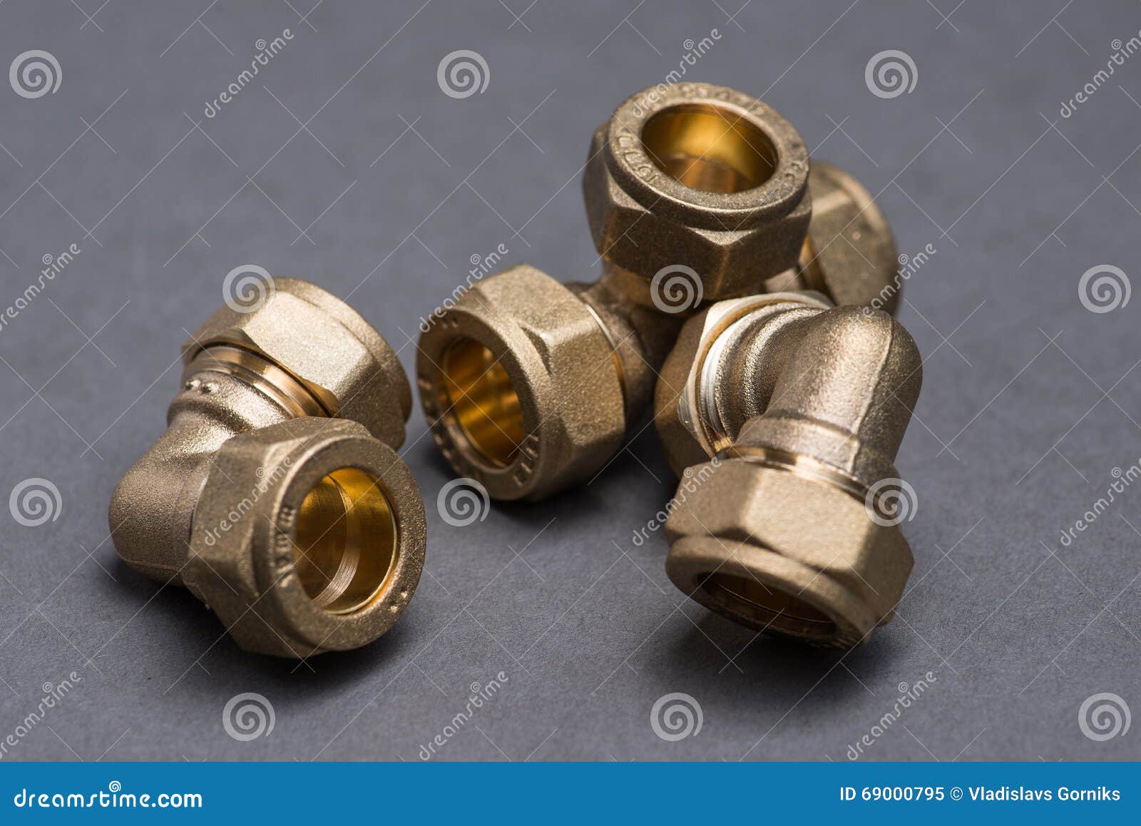 Brass Plumbing Compression Fittings on Grey Table Stock Image Image