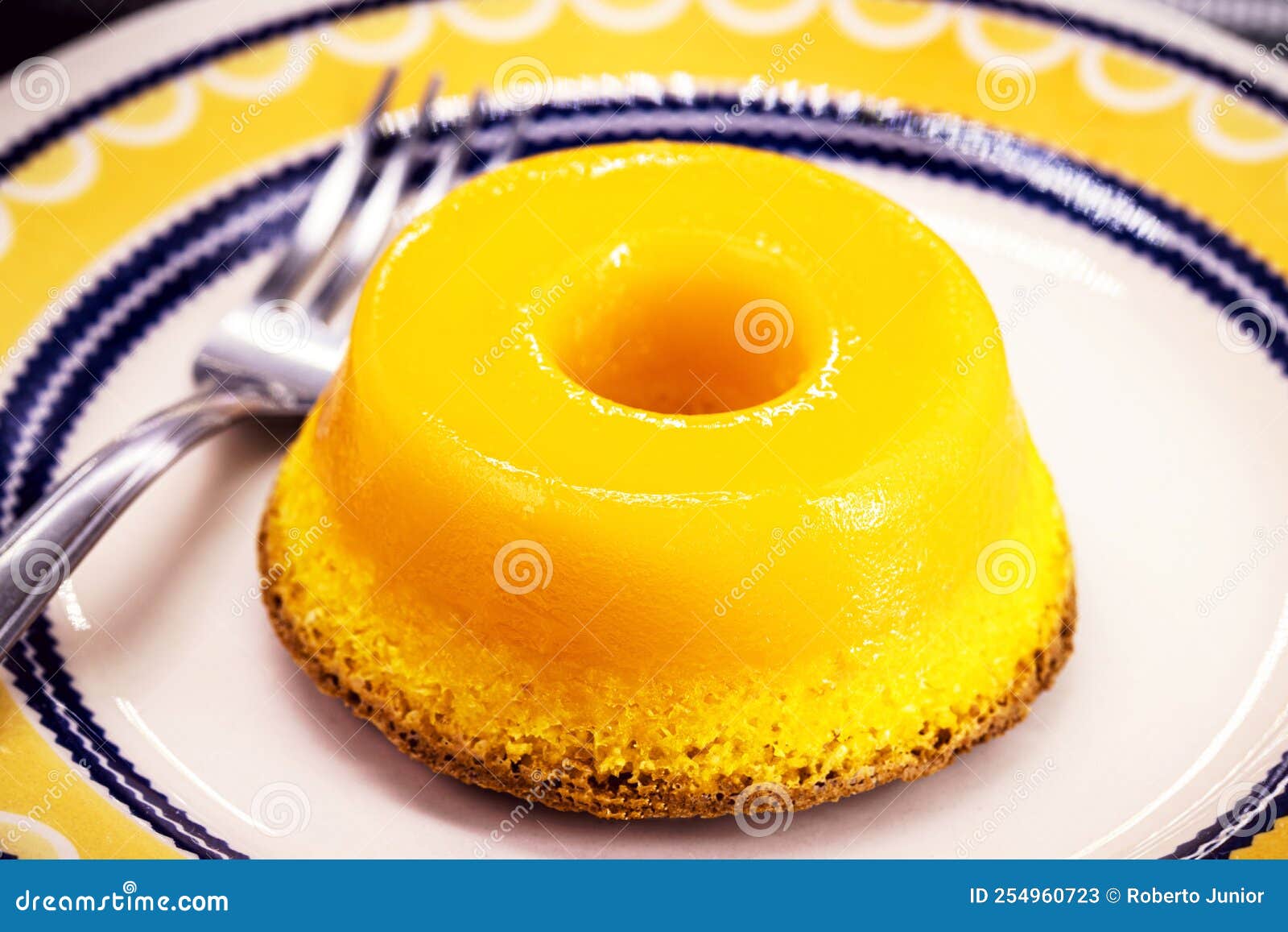 brazilian quindim is a sweet made from egg yolk, sugar and grated coconut. corresponds to the portuguese recipe known as brisa-do-