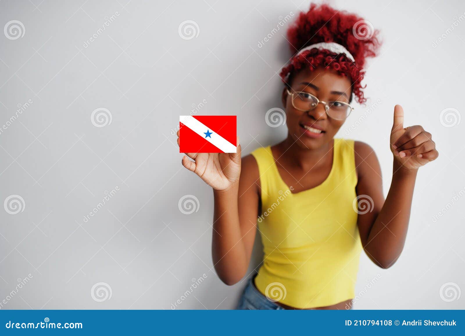 brazilian woman with afro hair hold para flag  on white background, show thumb up. states of brazil concept