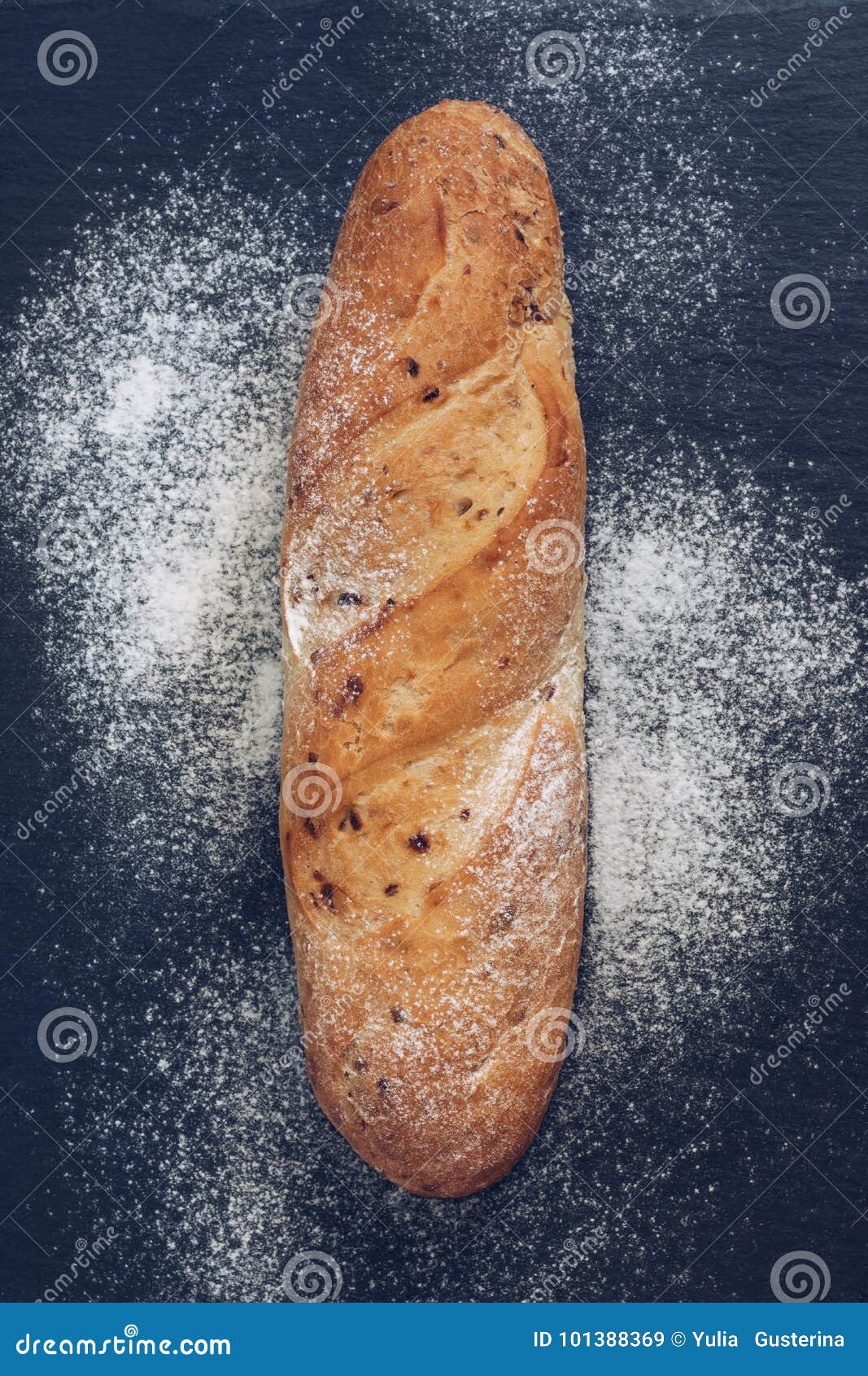 The Bread with Bean Flour on the Grey Surface.the Loaf on the Stone
