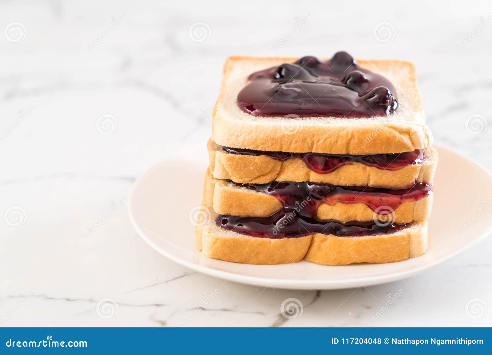 Bread with blueberry jam stock photo. Image of snack 117204048