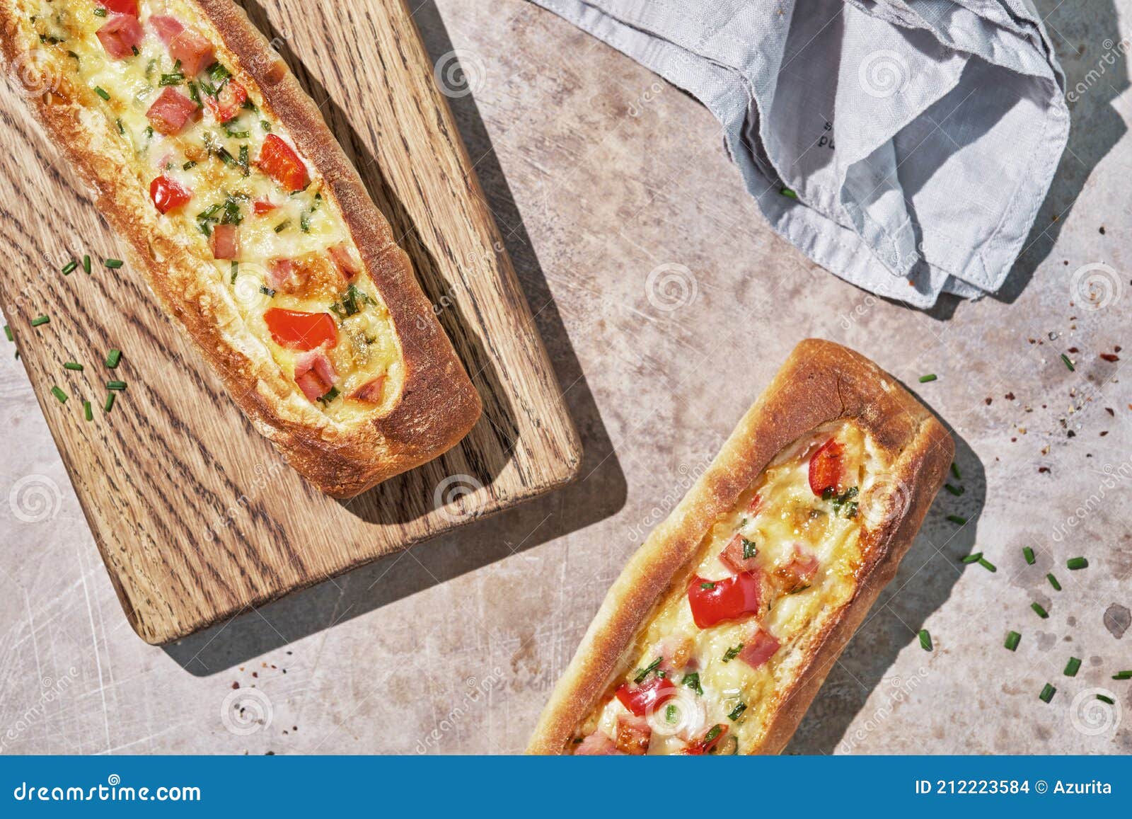 Bread Boats Stuffed with Ham, Egg and Cheese for Breakfast Stock Photo