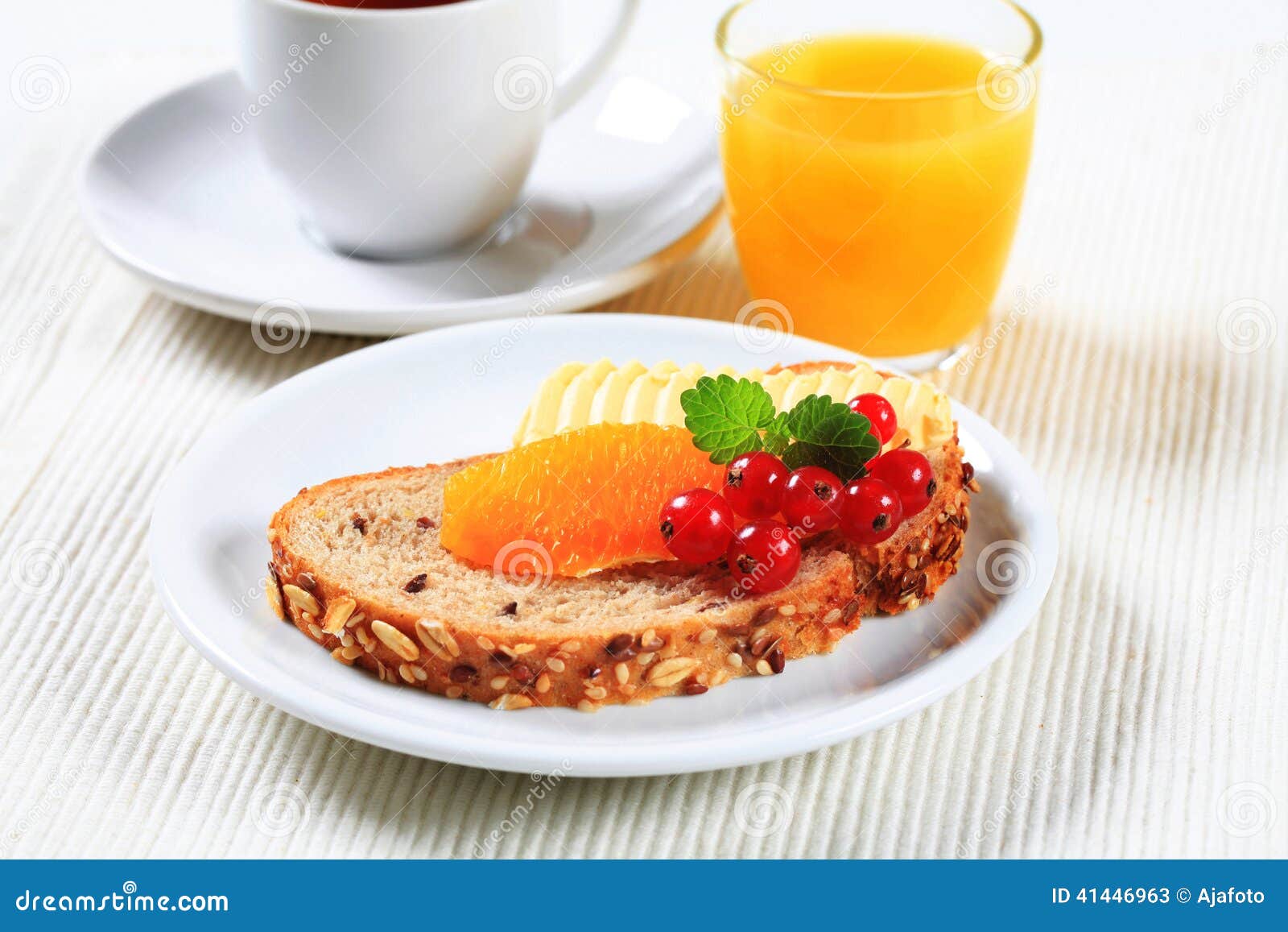 Bread with Butter, Cup of Tea and Orange Juice Stock Image Image of