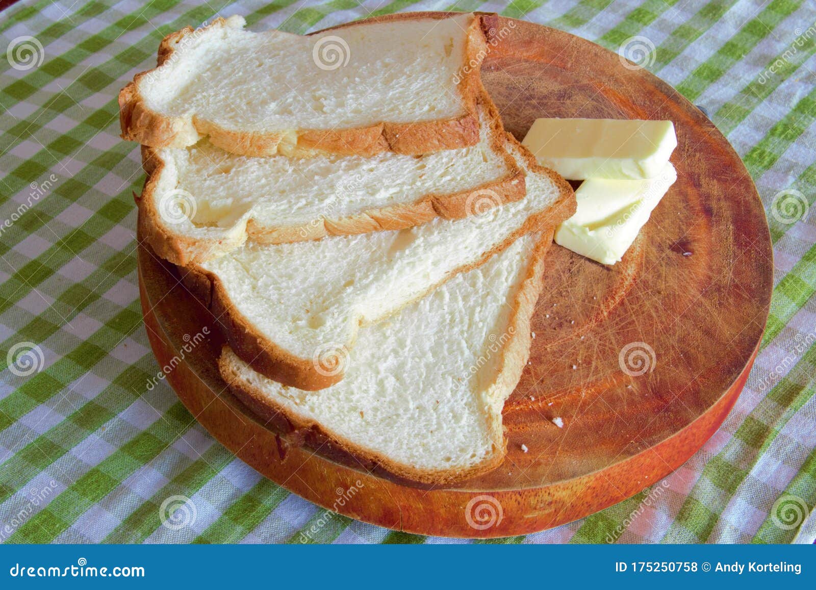 Bread And Butter On A Wooden Board And Green Table Cloth Stock Photo Image Of Filter Butter