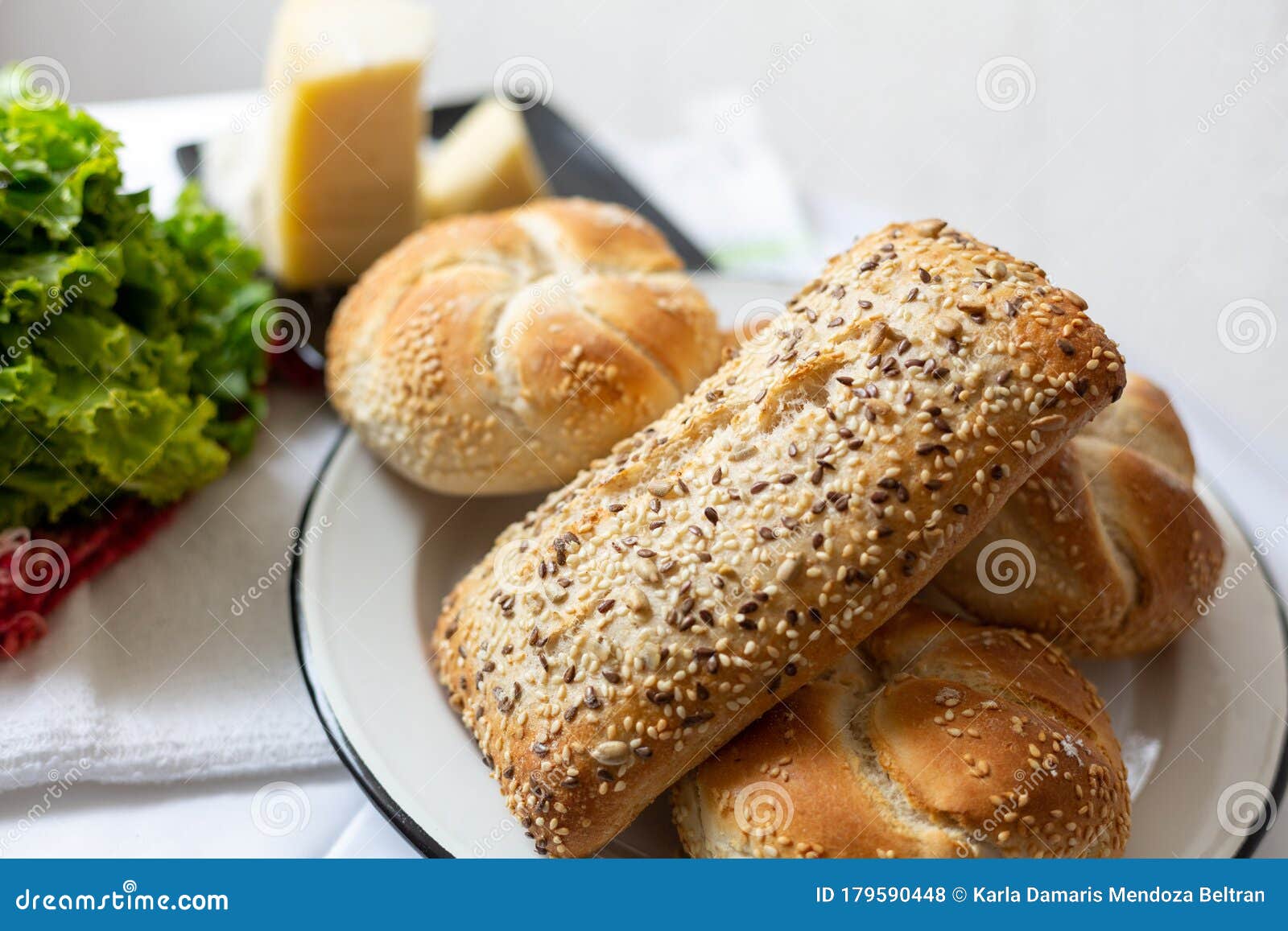 bread with cheese, lettuce and cakes