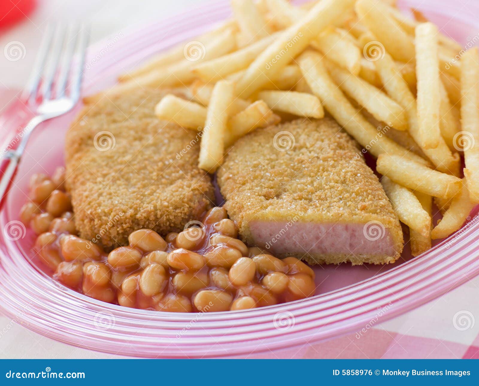 bread crumbed luncheon meat with baked beans