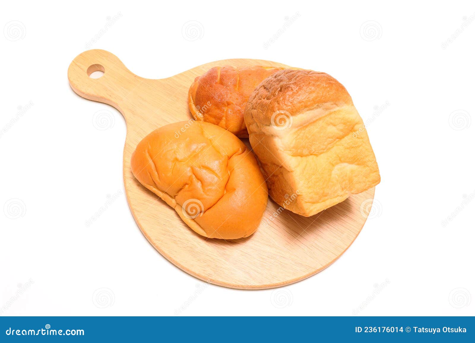 Bread on the Cutting Board Isolated on a White Background Stock Photo